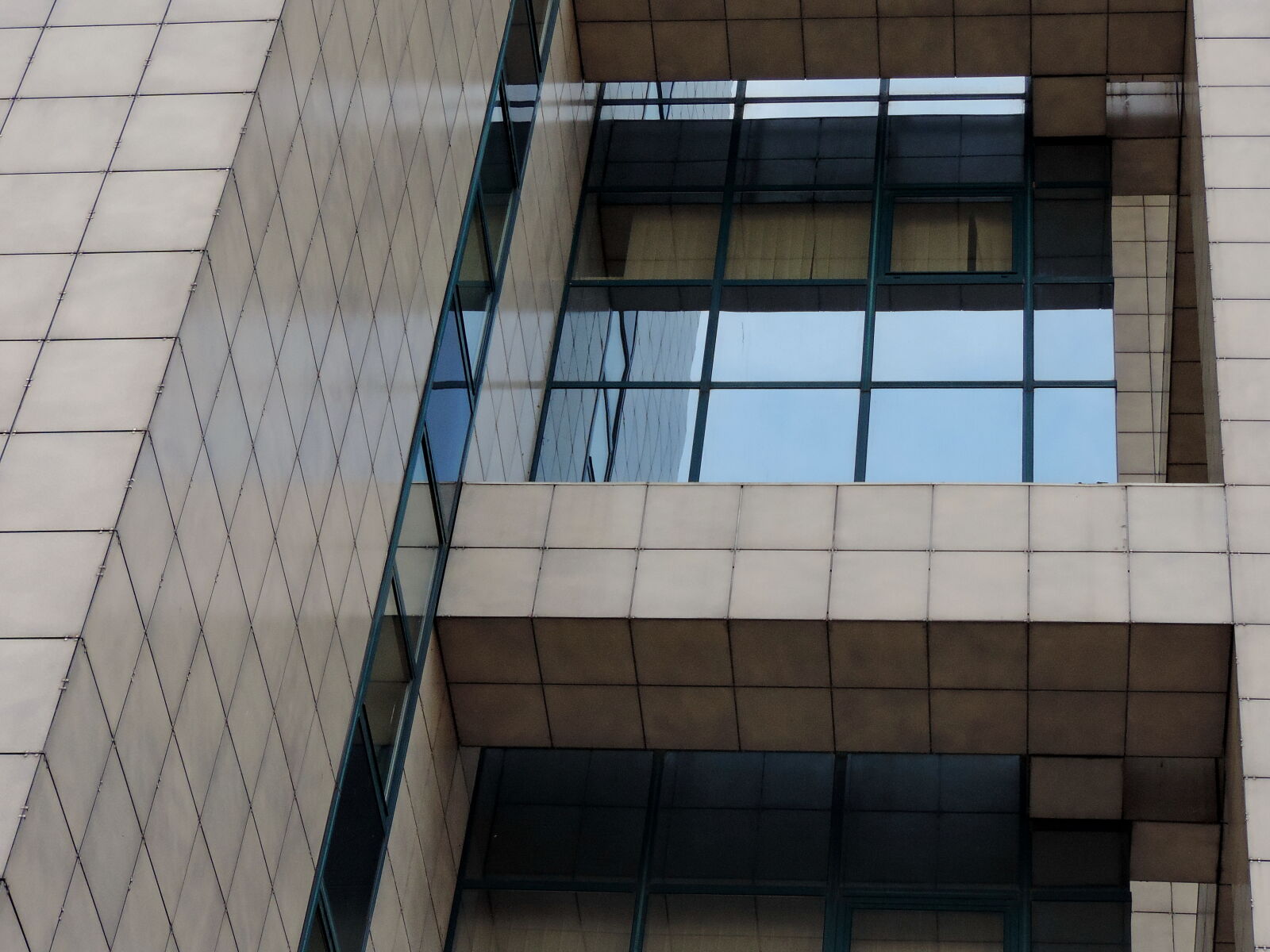 Nikon Coolpix P520 sample photo. Reflection, window, architecture, business photography