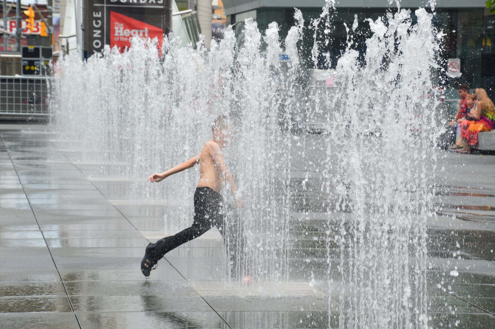 Nikon D3200 sample photo. Kids, playing, sprinkler, toronto photography
