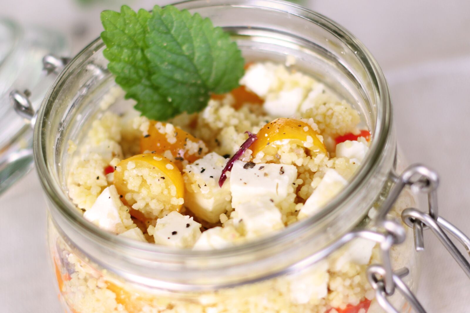 Canon EOS 60D + Canon EF 50mm F1.8 II sample photo. Couscous, salad, glass photography