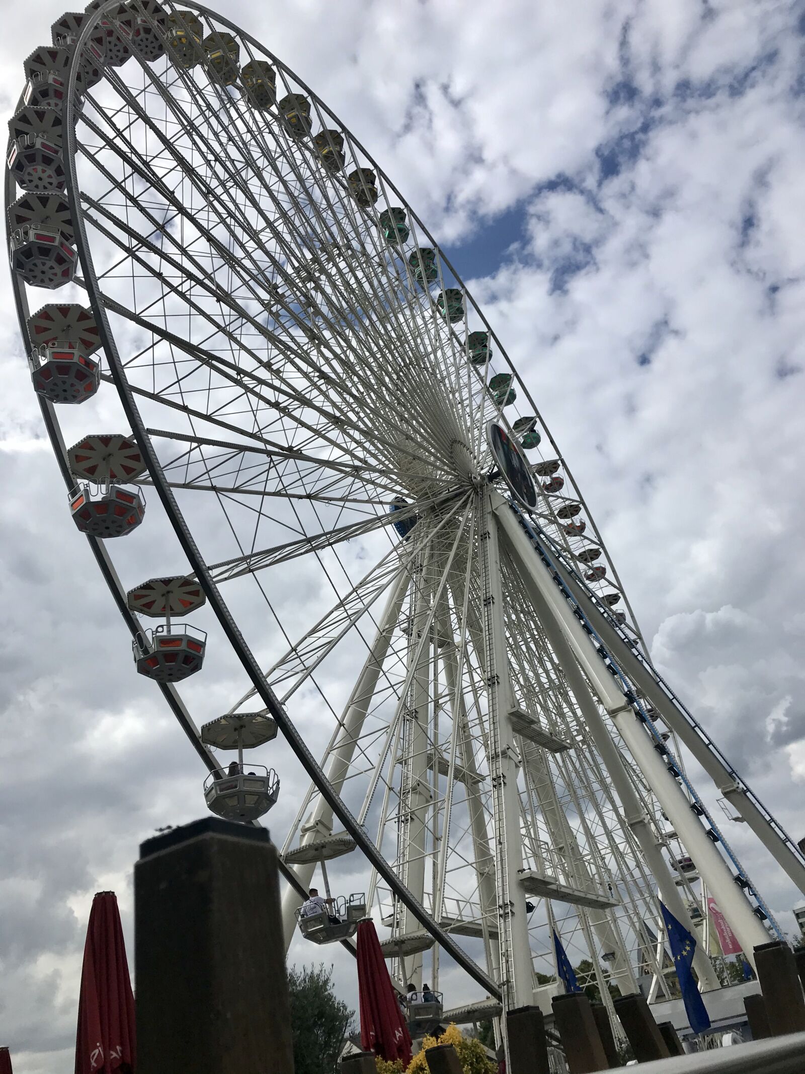 iPhone 7 back camera 3.99mm f/1.8 sample photo. Ferris wheel, cologne, summer photography