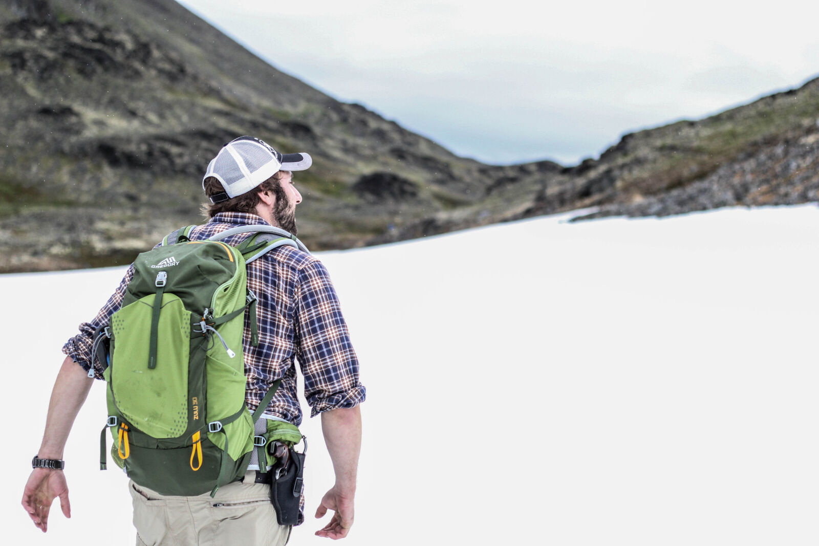 Canon EOS 60D + Canon EF 50mm F1.8 II sample photo. Alaskan, gun, hiker, hiking photography