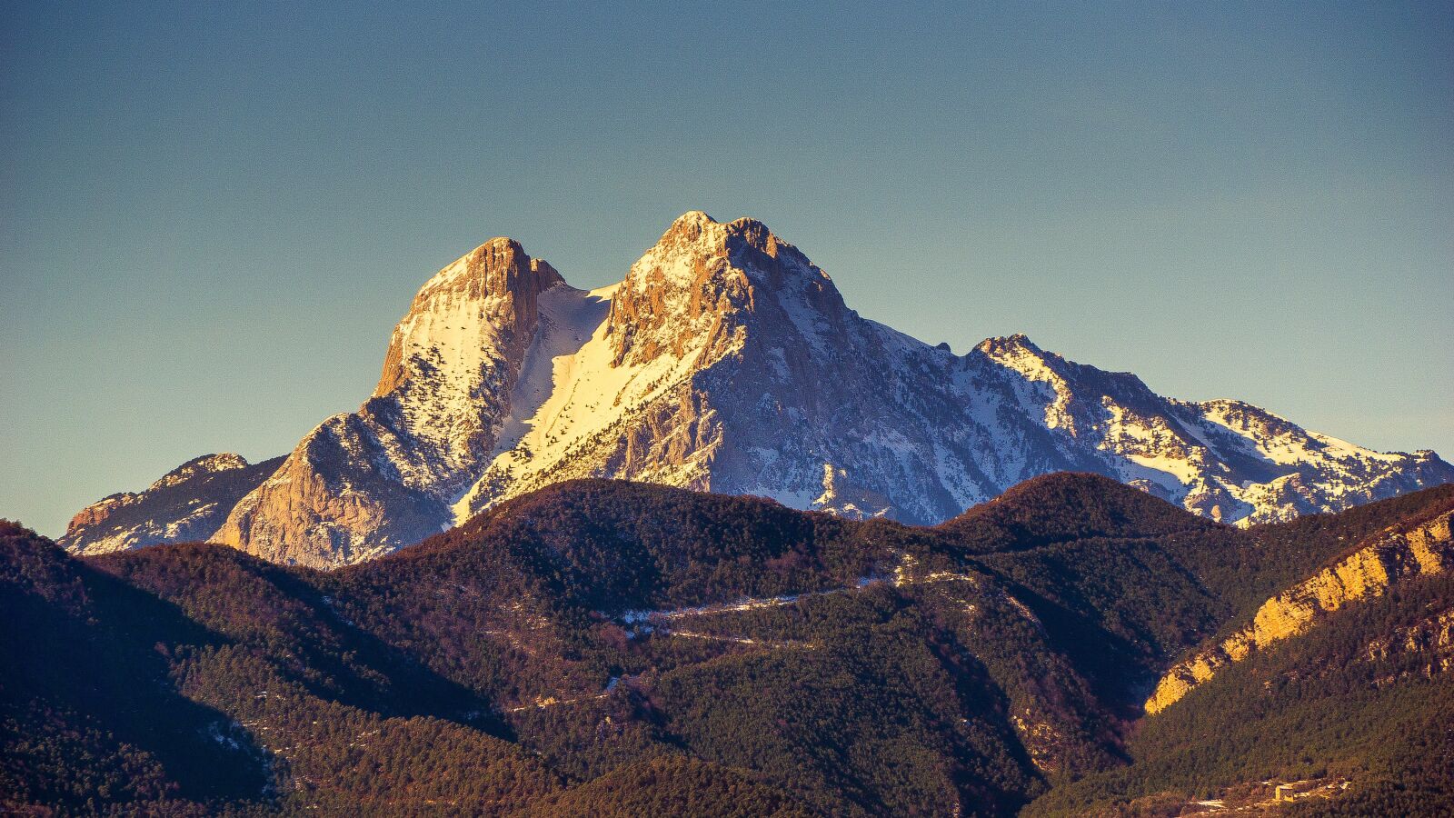 Sony E 55-210mm F4.5-6.3 OSS sample photo. Mountain, snow, rock photography