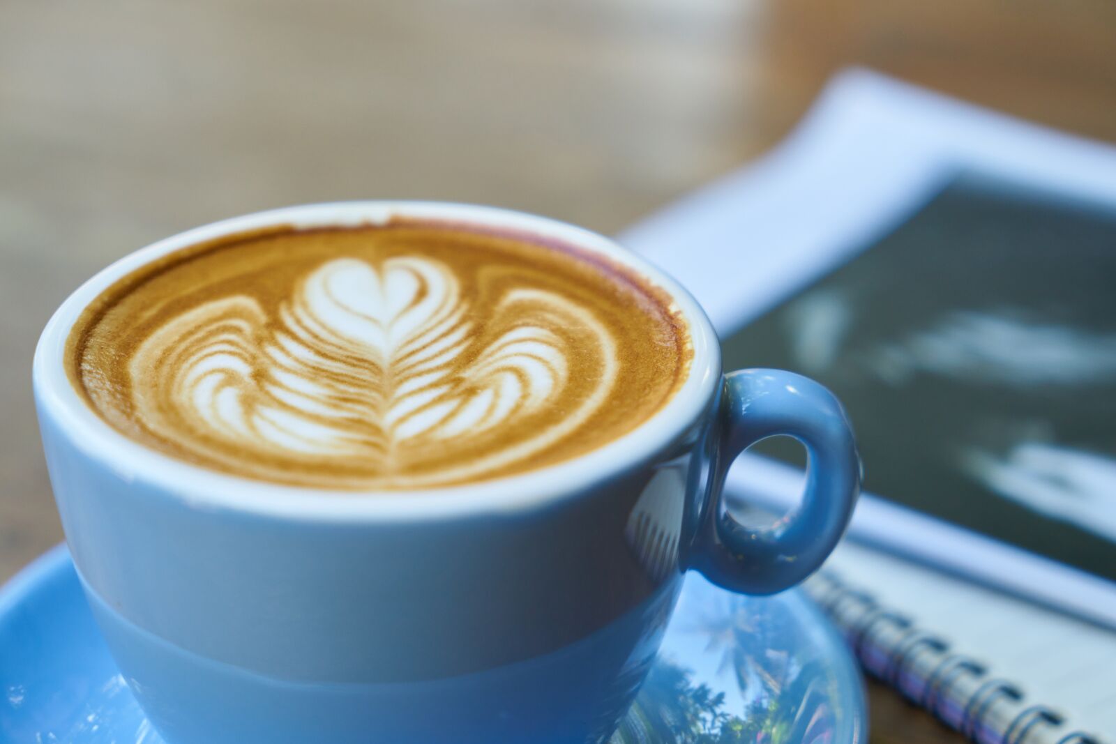 Sony a7R II sample photo. Coffee, magazine, read photography