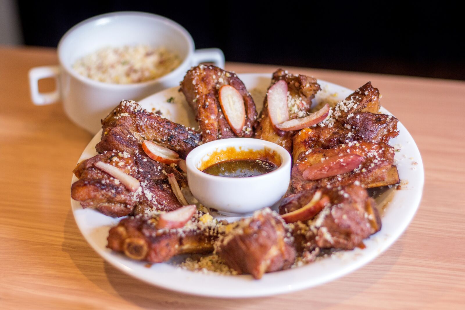 Canon EOS 60D + Canon EF 50mm F1.8 STM sample photo. Ribs, sauce, pinion photography