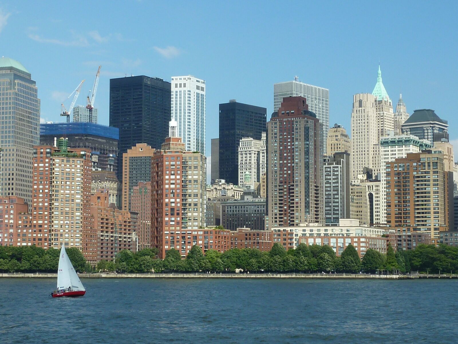 Panasonic DMC-TZ7 sample photo. Buildings, boat, manhattan photography