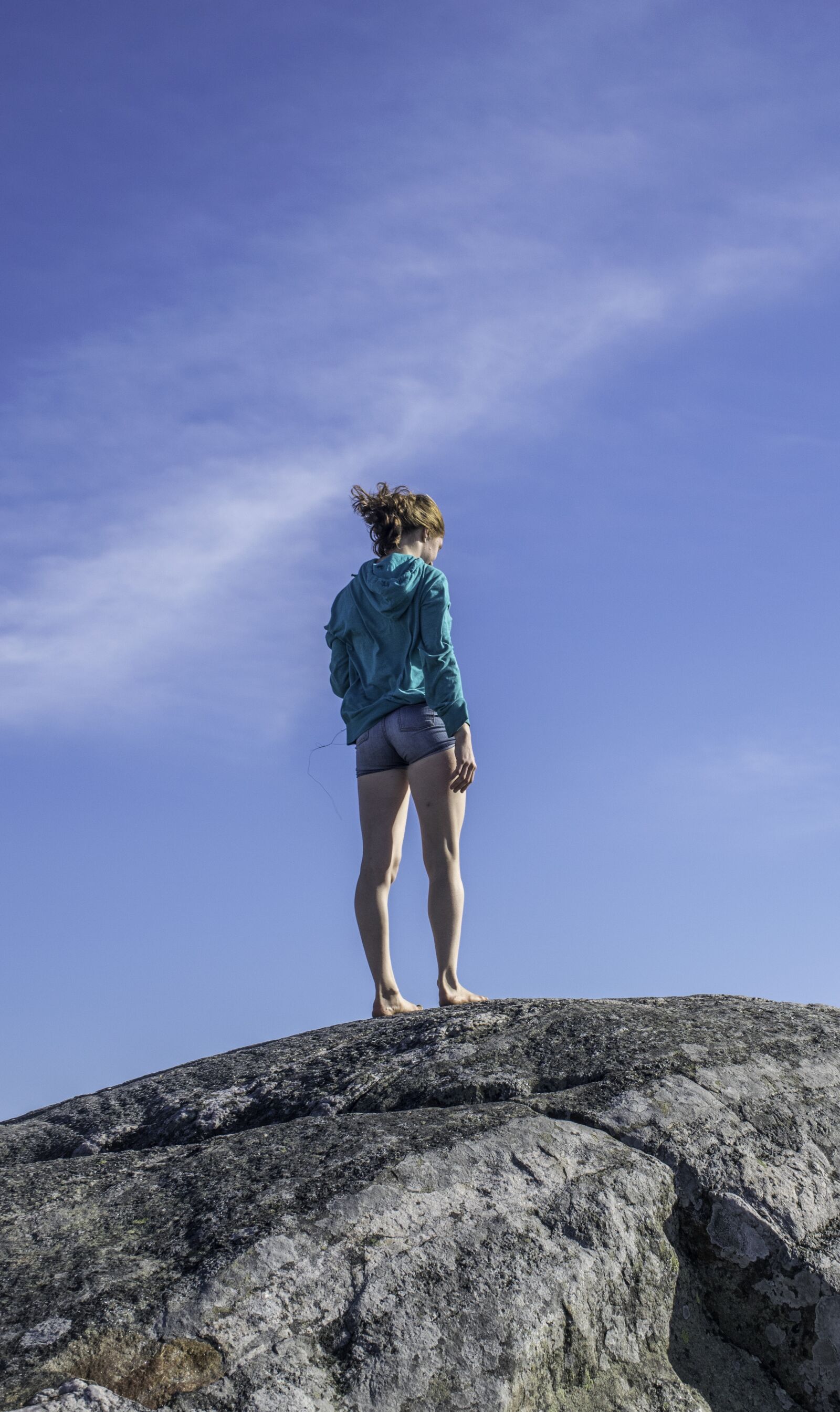 Nikon D5300 sample photo. Young woman, windy, rock photography
