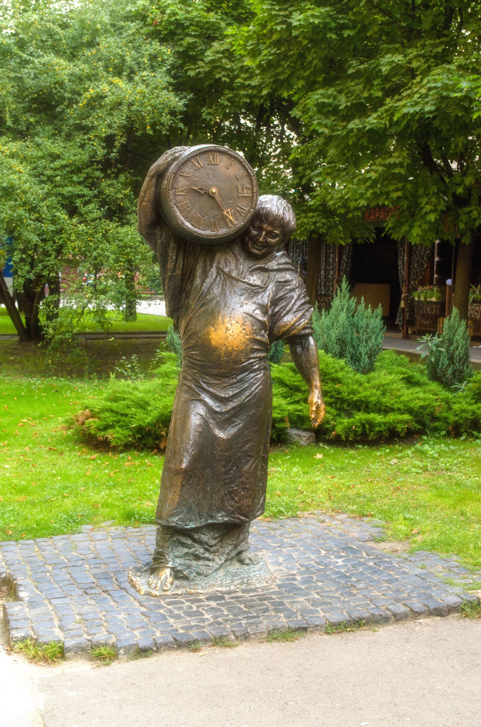 Nikon D5100 sample photo. Clock, sculpture, bronze photography