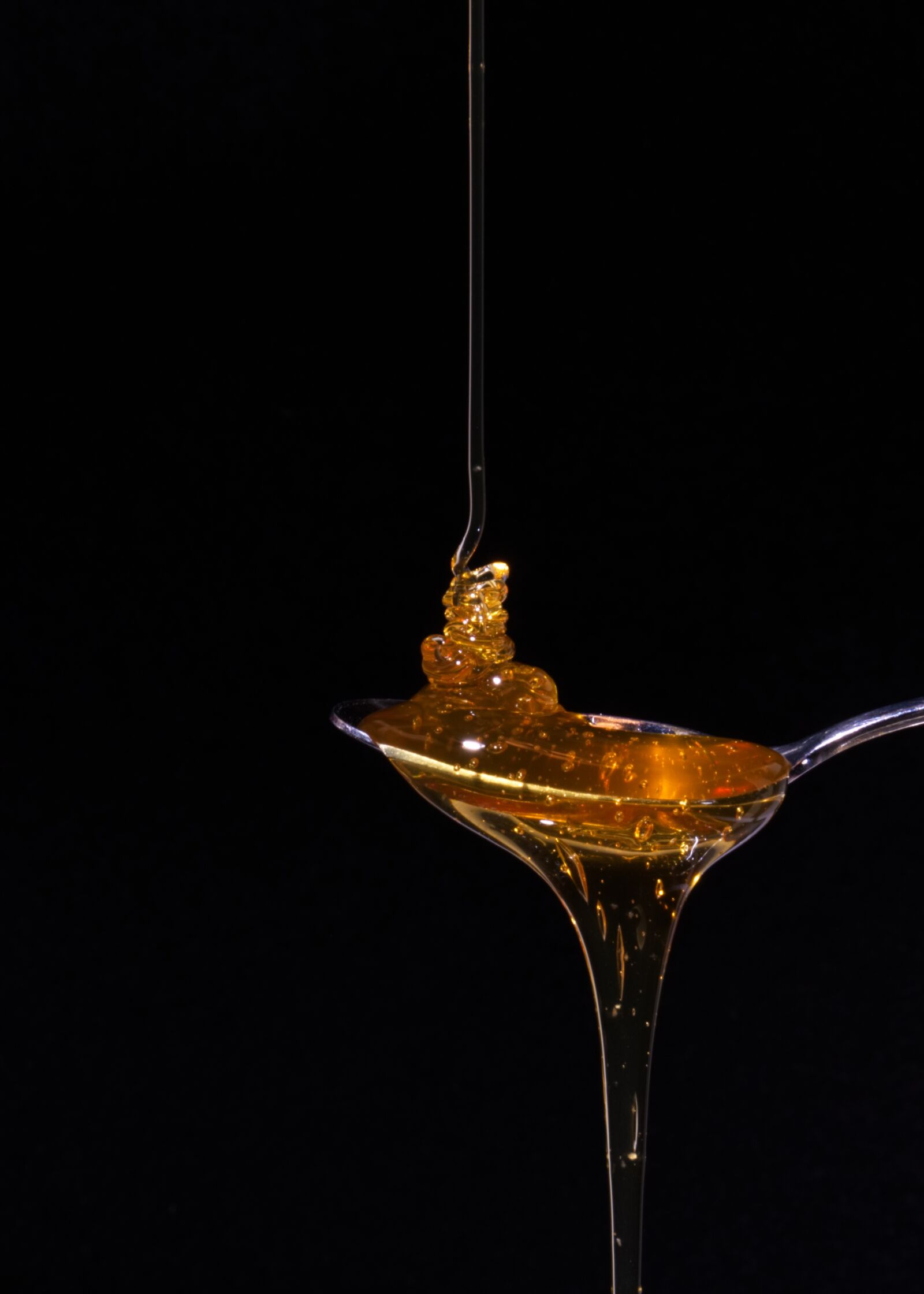 Fujifilm X-T2 + Fujifilm XF 55-200mm F3.5-4.8 R LM OIS sample photo. Liquid, reflection, golden photography