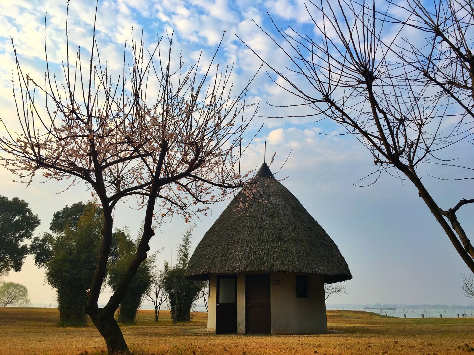 Apple iPhone 6s sample photo. Blue sky, thatched cottage photography
