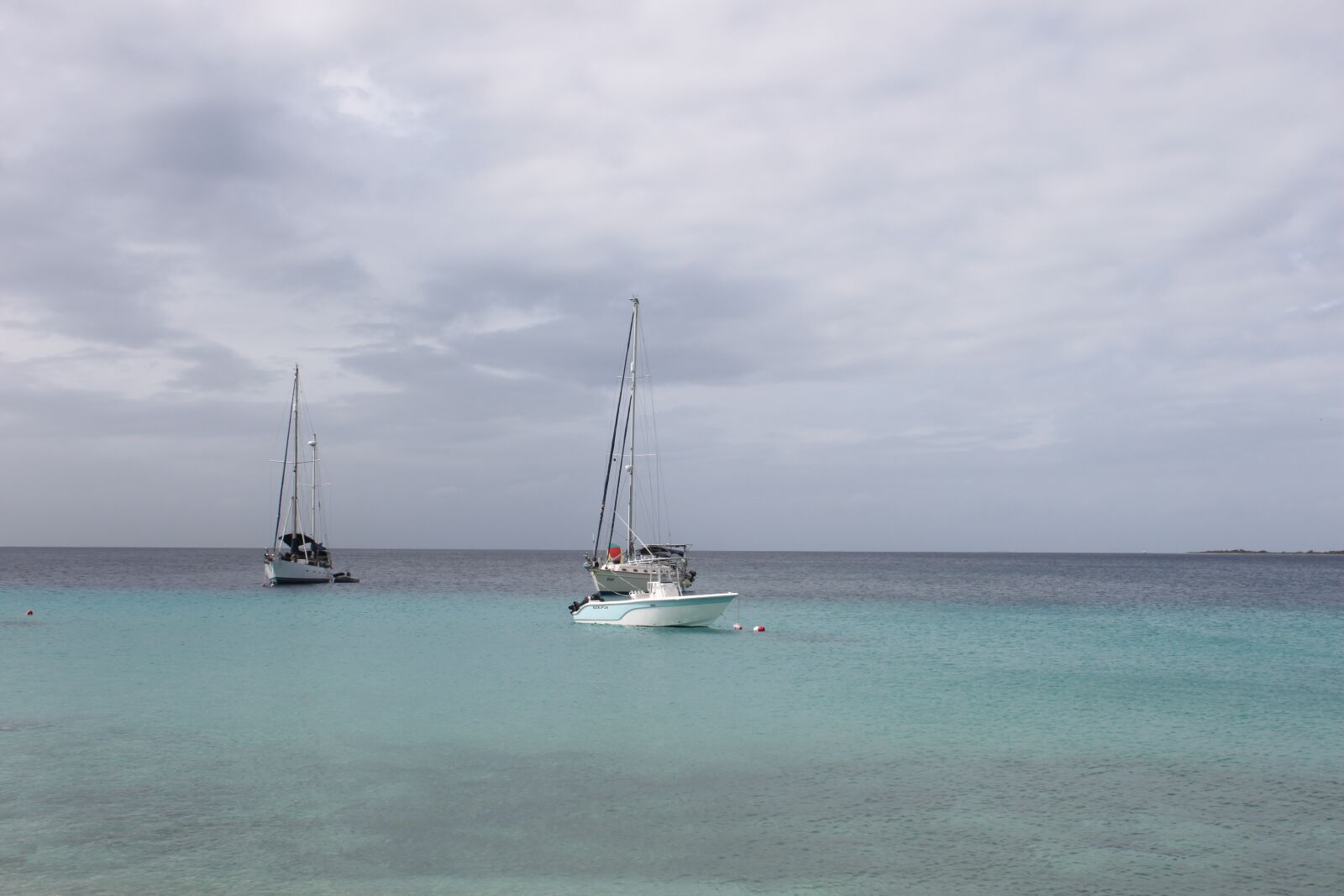 Canon EOS 500D (EOS Rebel T1i / EOS Kiss X3) sample photo. Sea, boat, cloud photography