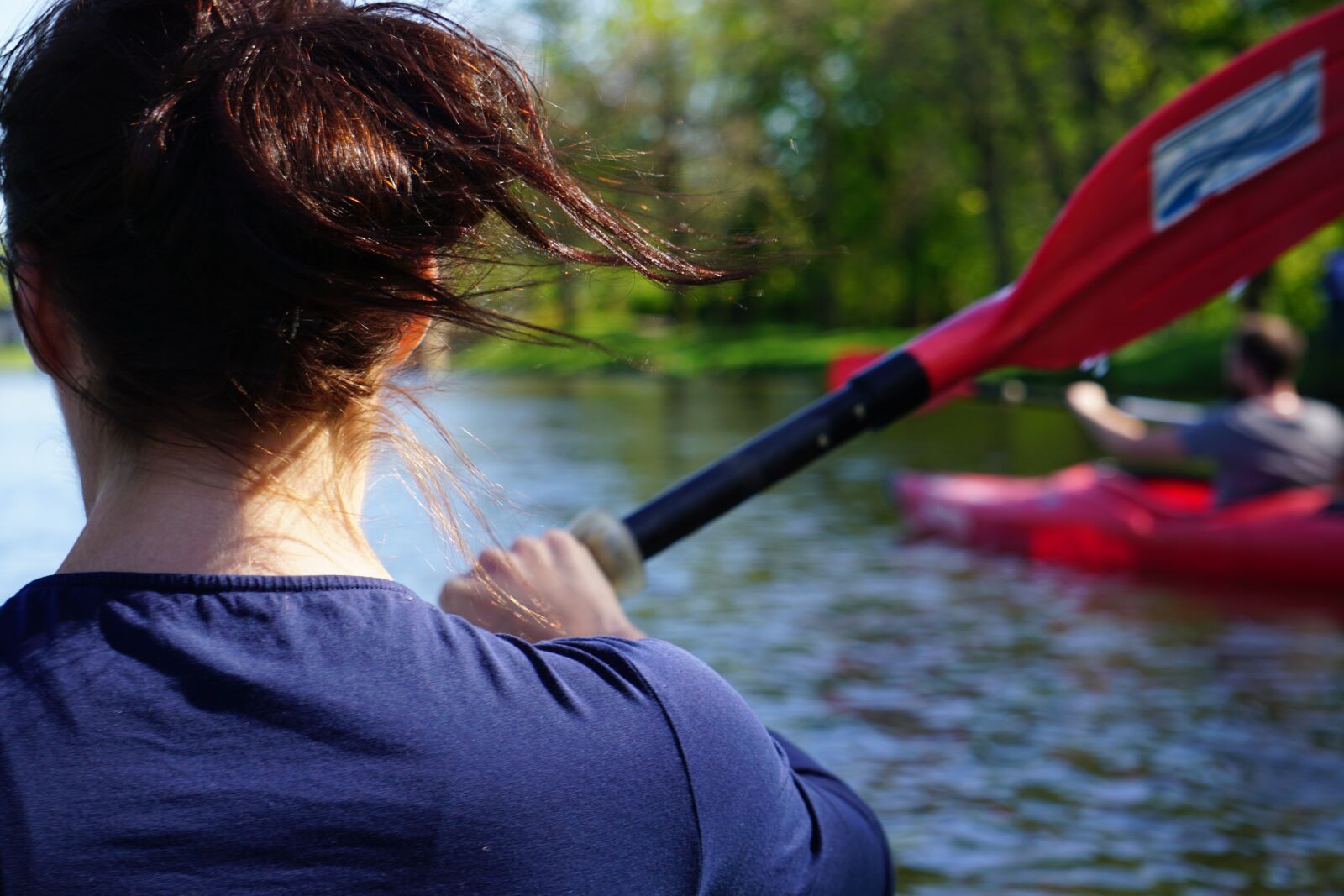 Sony E 55-210mm F4.5-6.3 OSS sample photo. Paddle, water, boat photography