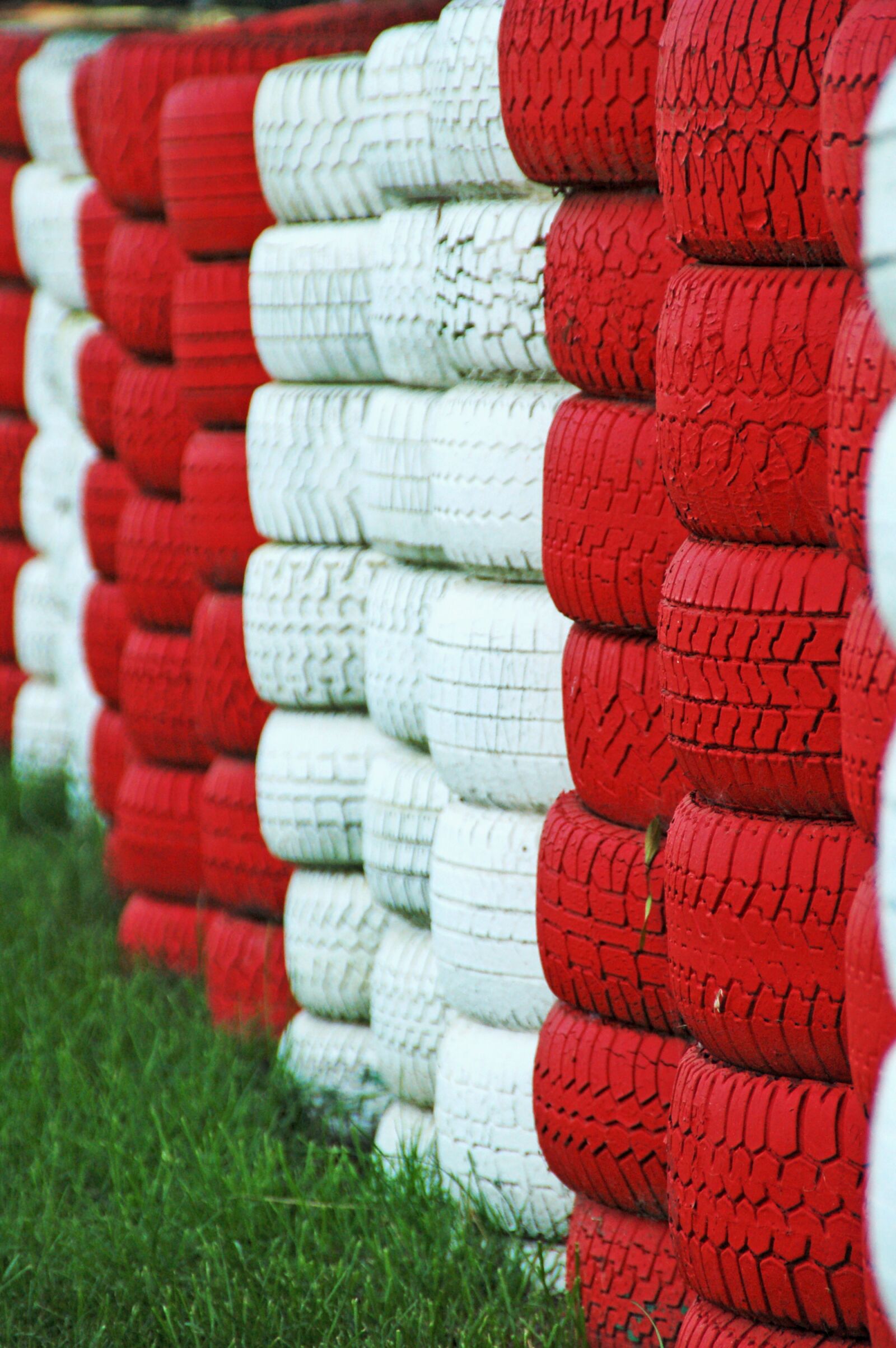 Nikon D50 sample photo. Tires, race track, red photography
