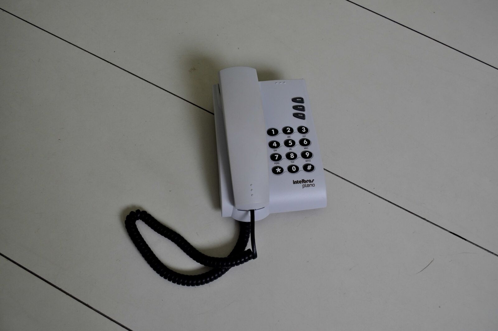Nikon D5000 sample photo. White, phone, black, wire photography