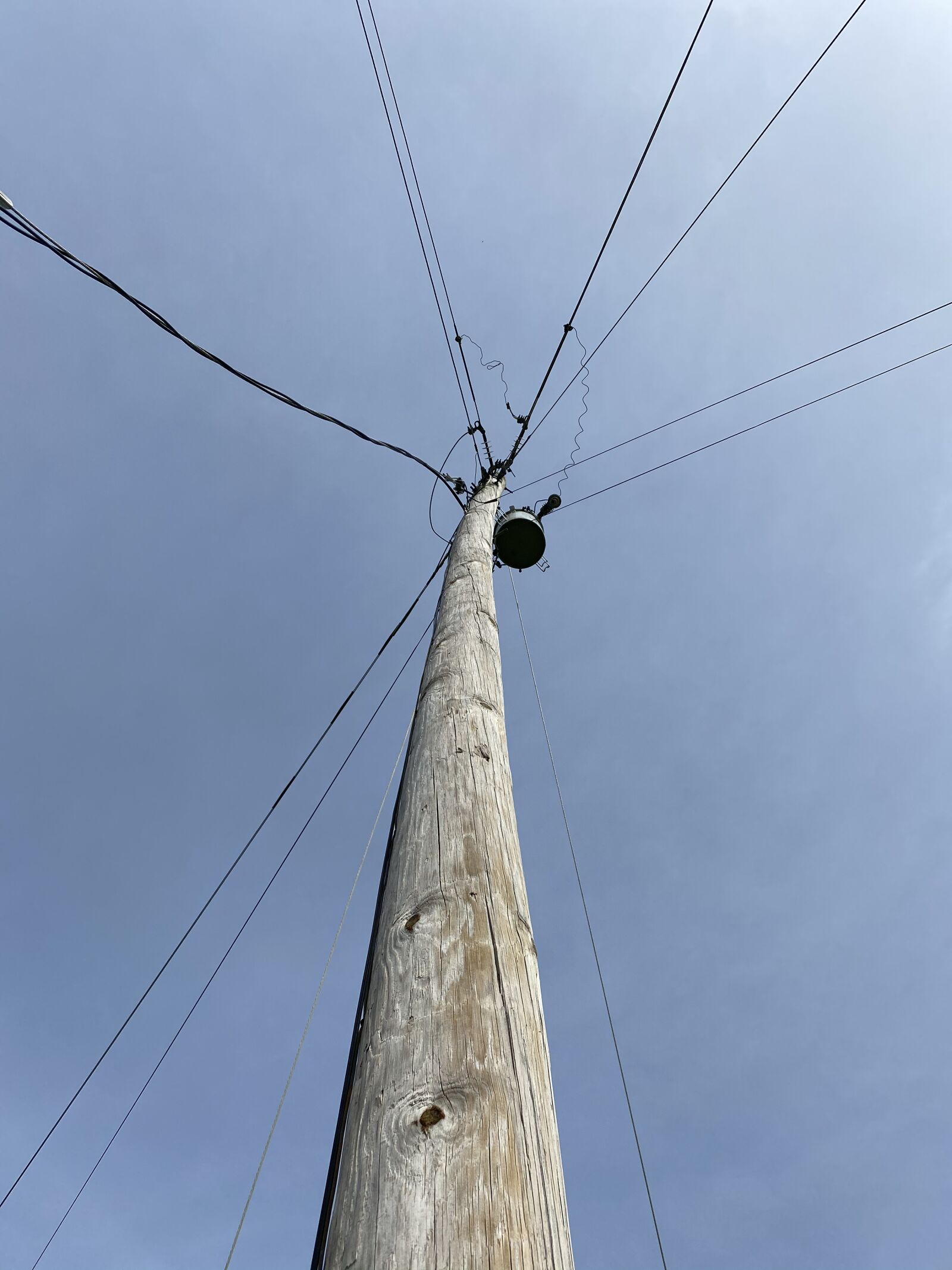 Apple iPhone 11 sample photo. Pole, wire, sky photography