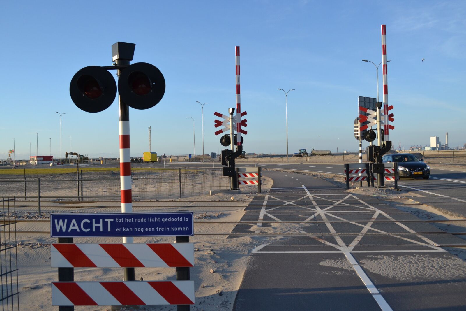 Nikon D3100 sample photo. Railway crossing, track, rails photography