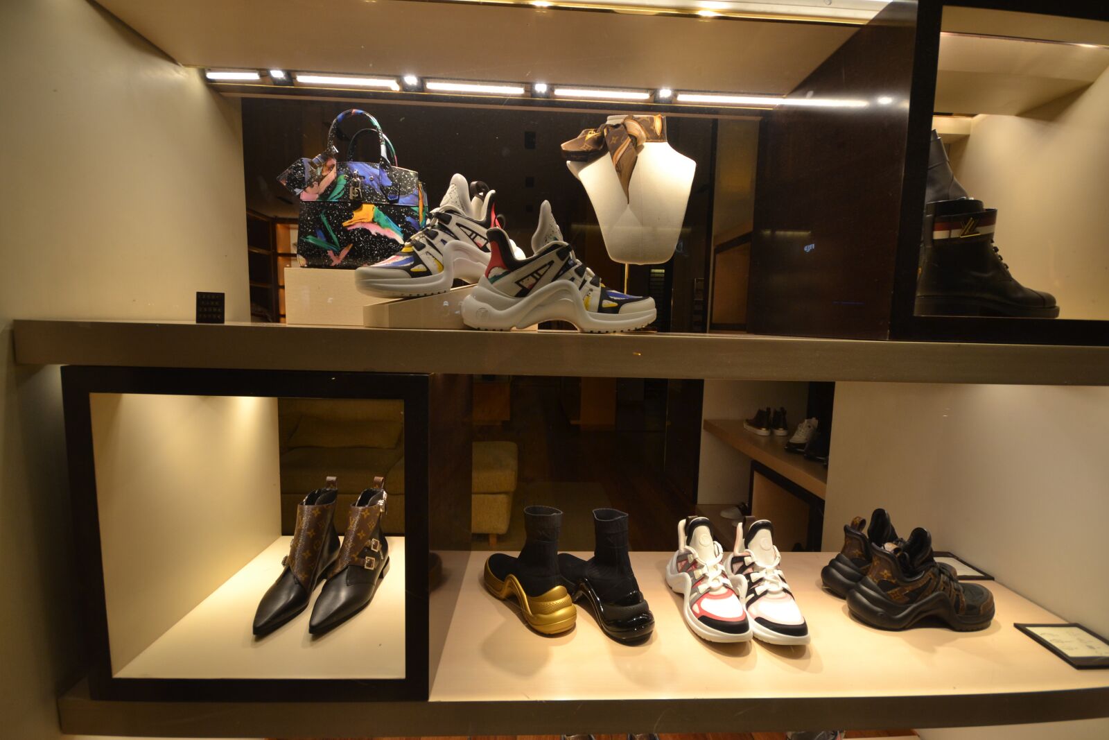 Nikon D3100 sample photo. Shoes, showcase, shop photography