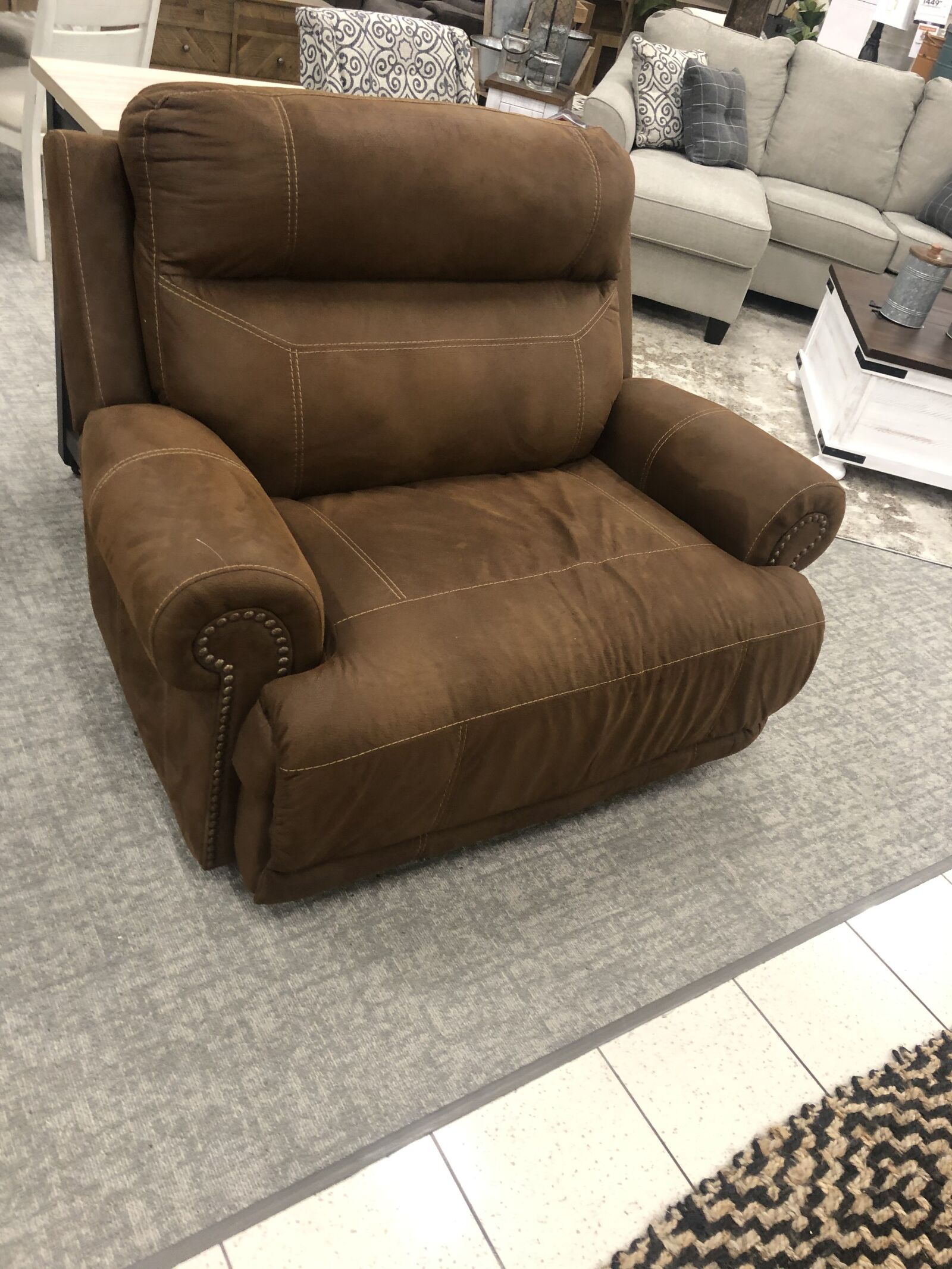 iPhone X back dual camera 4mm f/1.8 sample photo. Recliner, furniture store, home photography