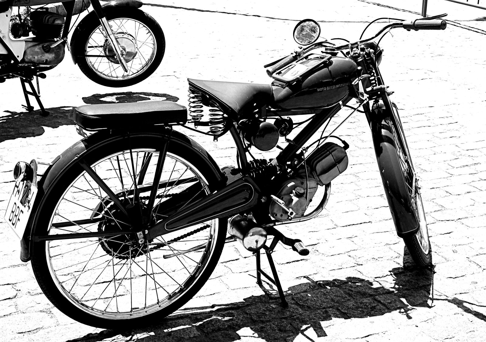 Olympus OM-D E-M1 + OLYMPUS M.12-50mm F3.5-6.3 sample photo. Motorcycle, old bike, black photography