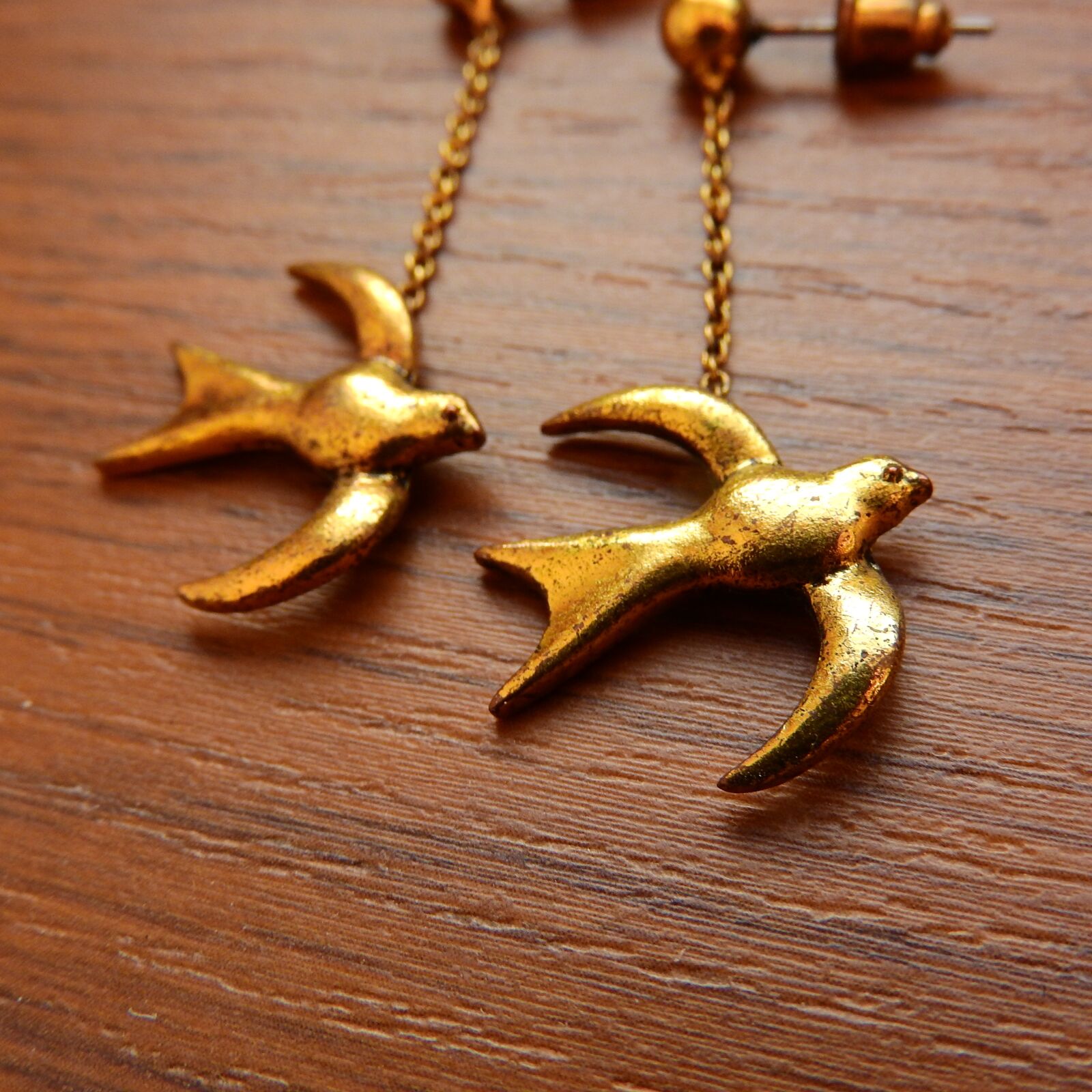 Nikon Coolpix P610 sample photo. Earrings, swallows, gold earrings photography
