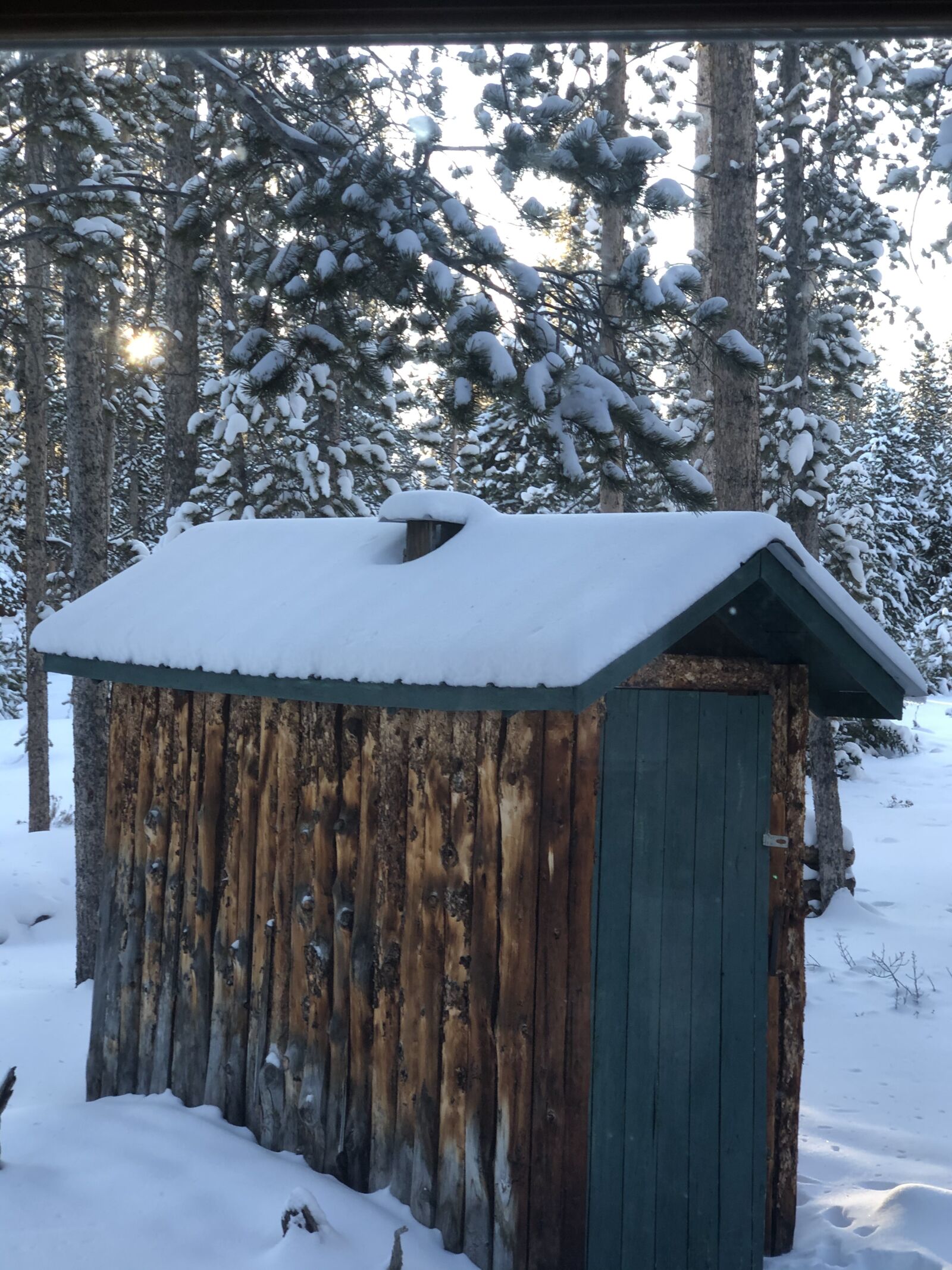 iPhone X back dual camera 6mm f/2.4 sample photo. Outhouse, colorado, pine photography