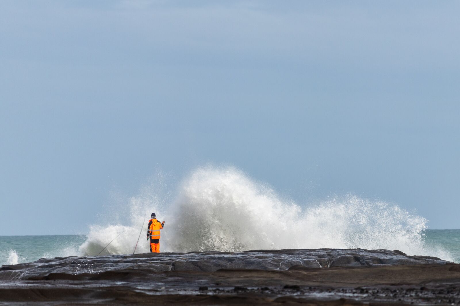 Canon EF-S 55-250mm F4-5.6 IS STM sample photo. Fishing, rocks, water photography