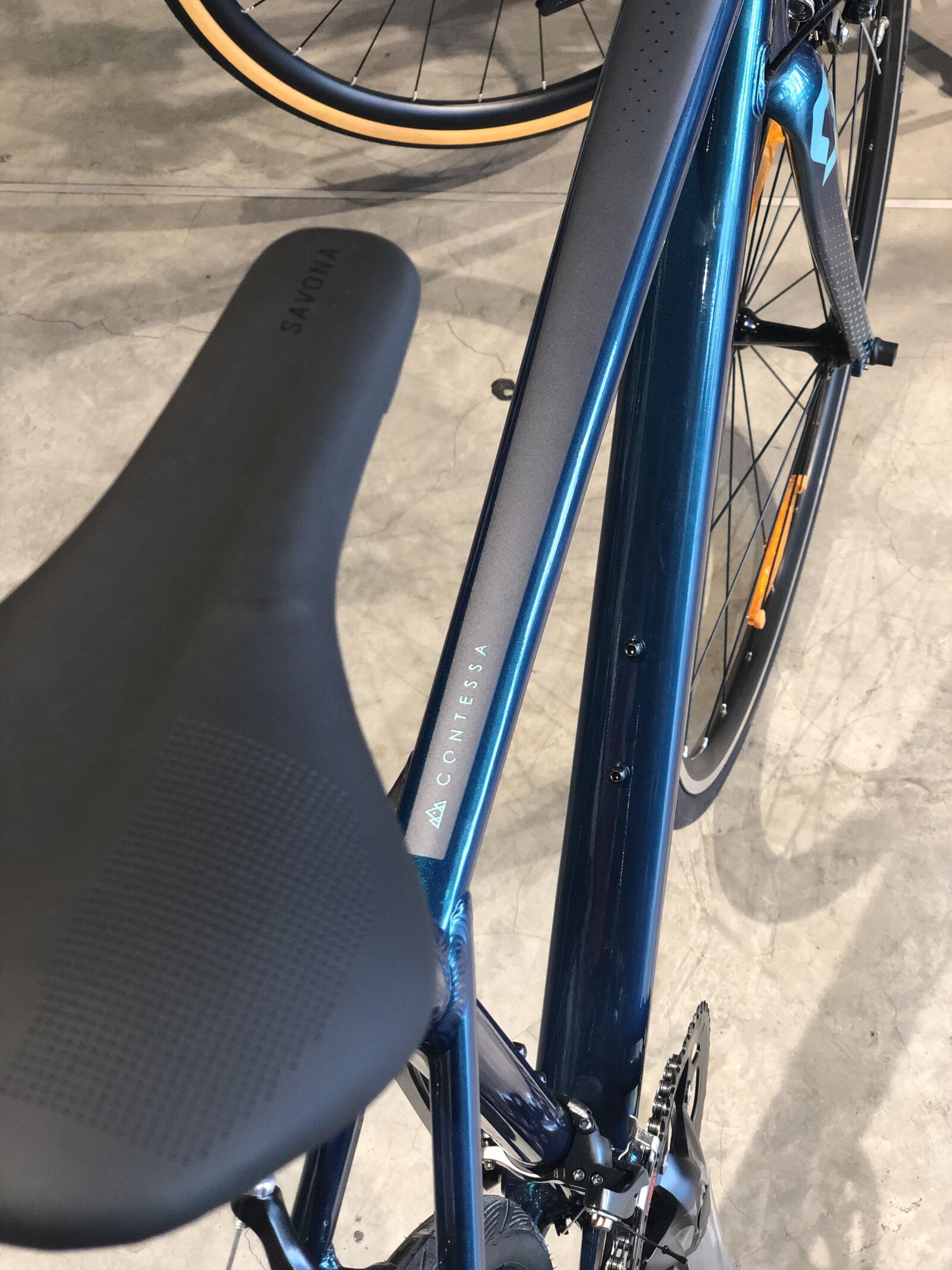 iPhone X back dual camera 6mm f/2.4 sample photo. Bicycle, store, mtb photography