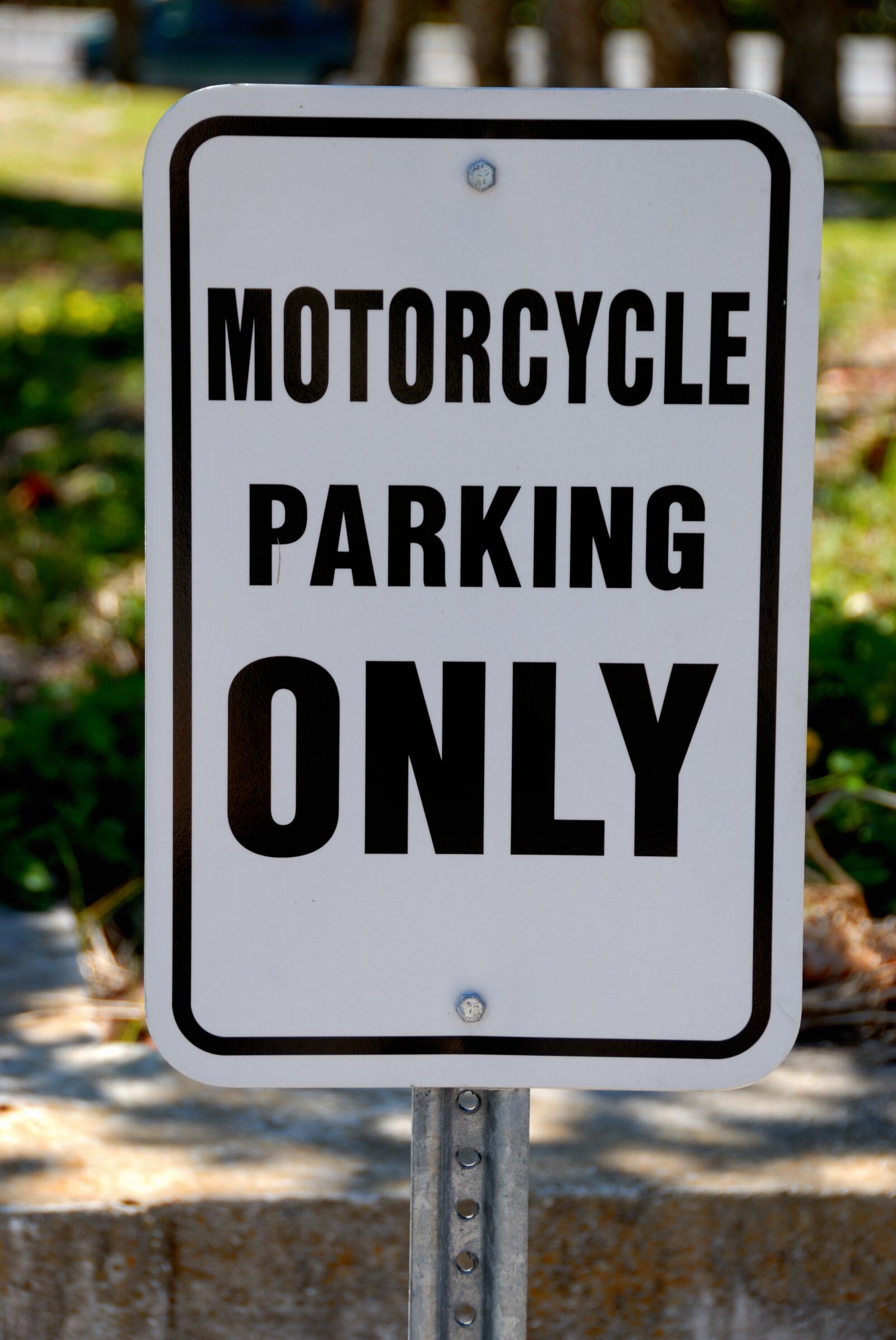 Nikon D200 sample photo. Motorcycle parking, sign, motorcycle photography