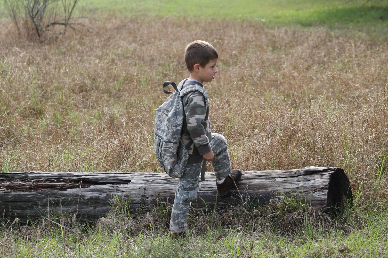 Canon EF 75-300mm f/4-5.6 sample photo. Boy, nature, camouflage photography
