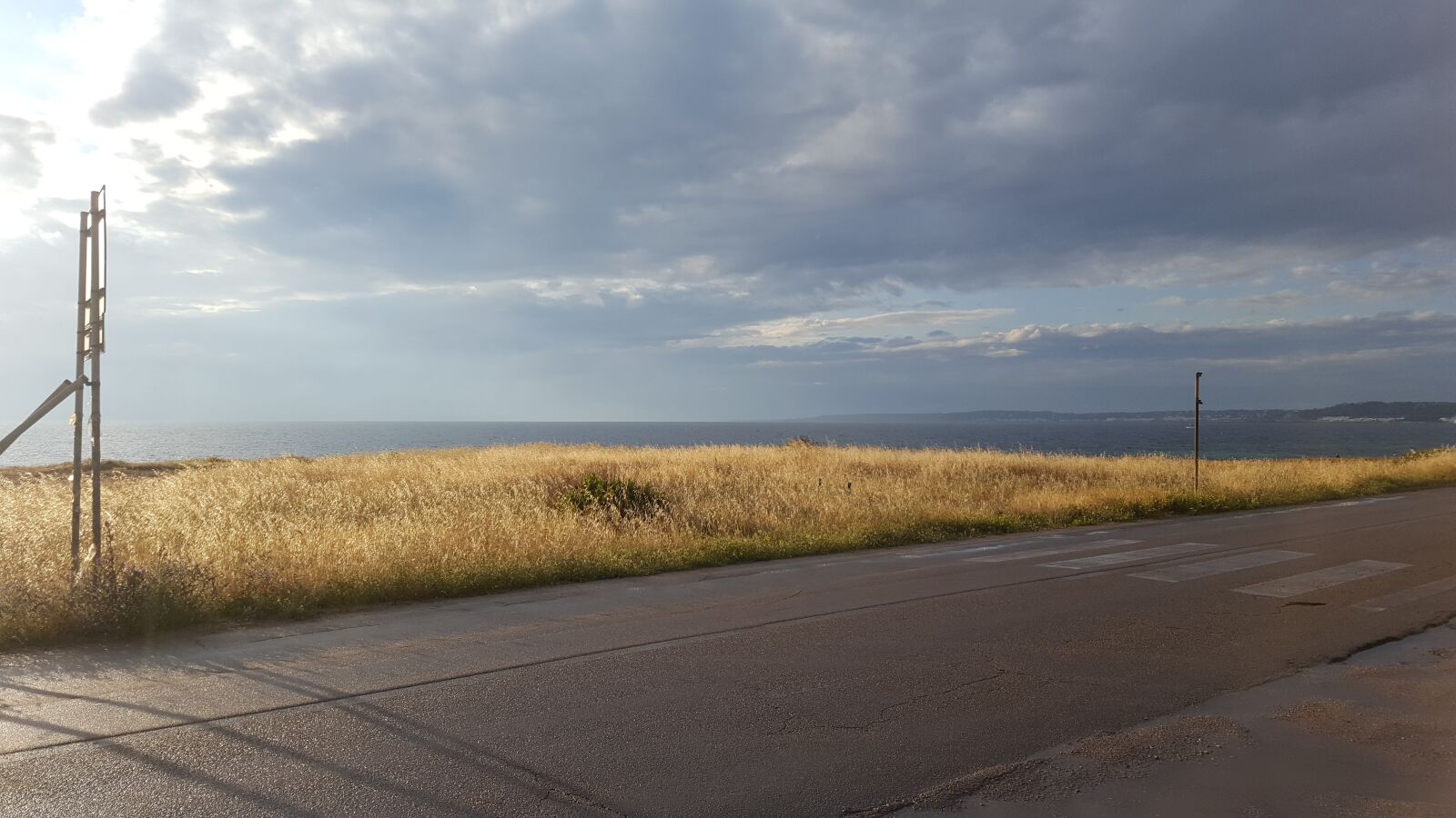 Samsung Galaxy S6 sample photo. Road, grass, sea photography