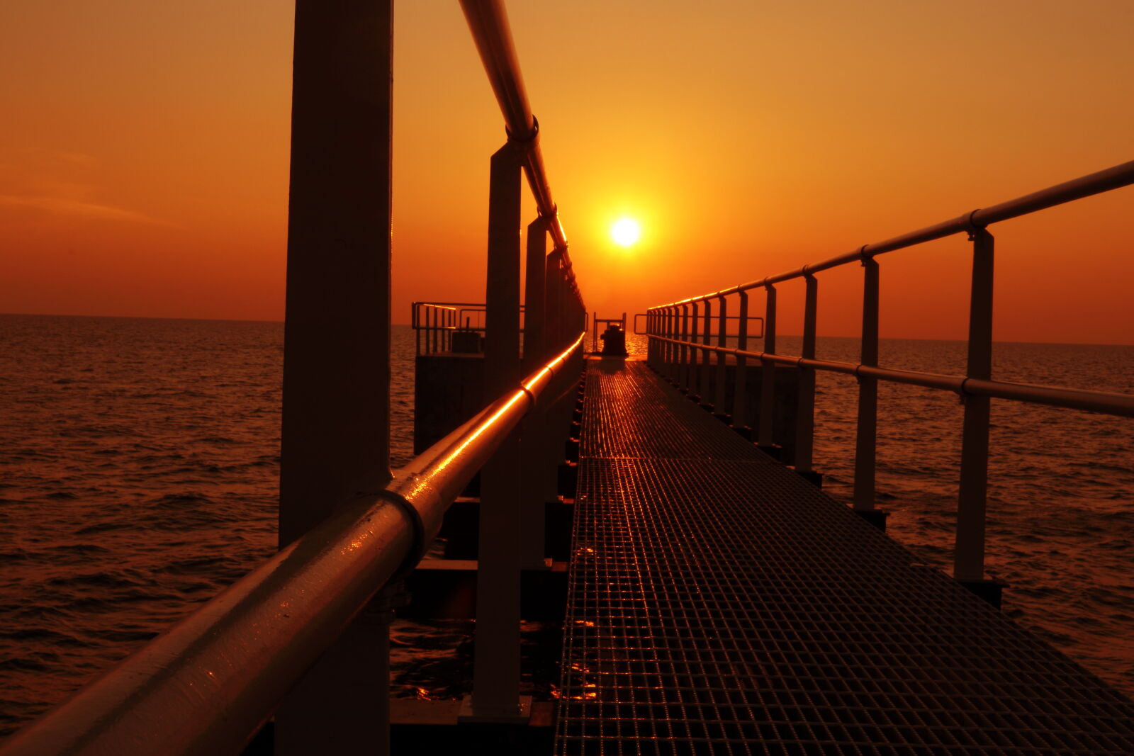 Canon EF-S 24mm F2.8 STM sample photo. Sunset at jetty photography