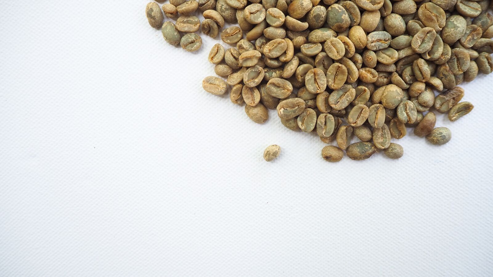Olympus OM-D E-M10 III sample photo. Green beans, green coffee photography