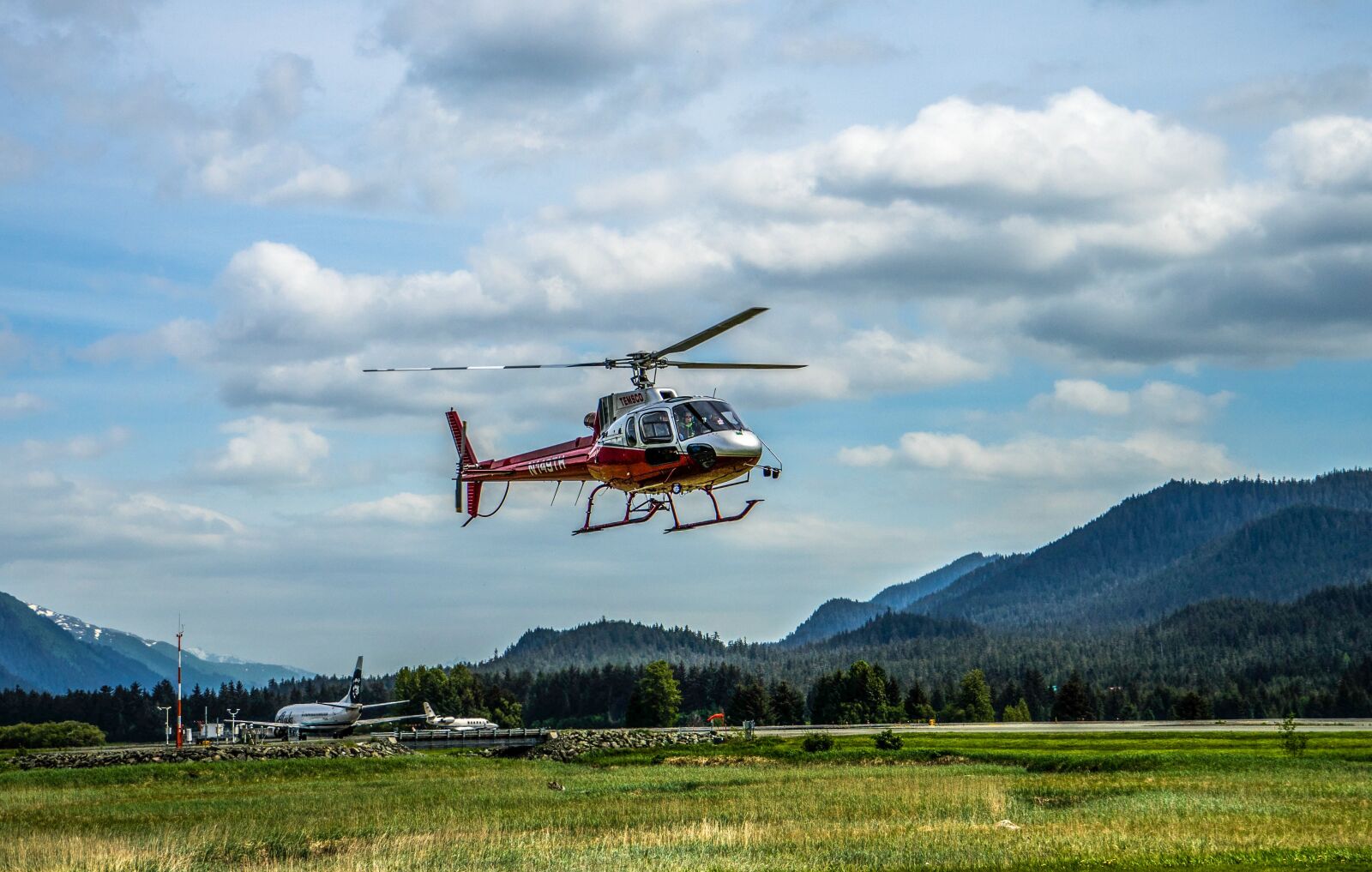 Sony E 18-200mm F3.5-6.3 OSS sample photo. Helicopter, flying, alaska photography