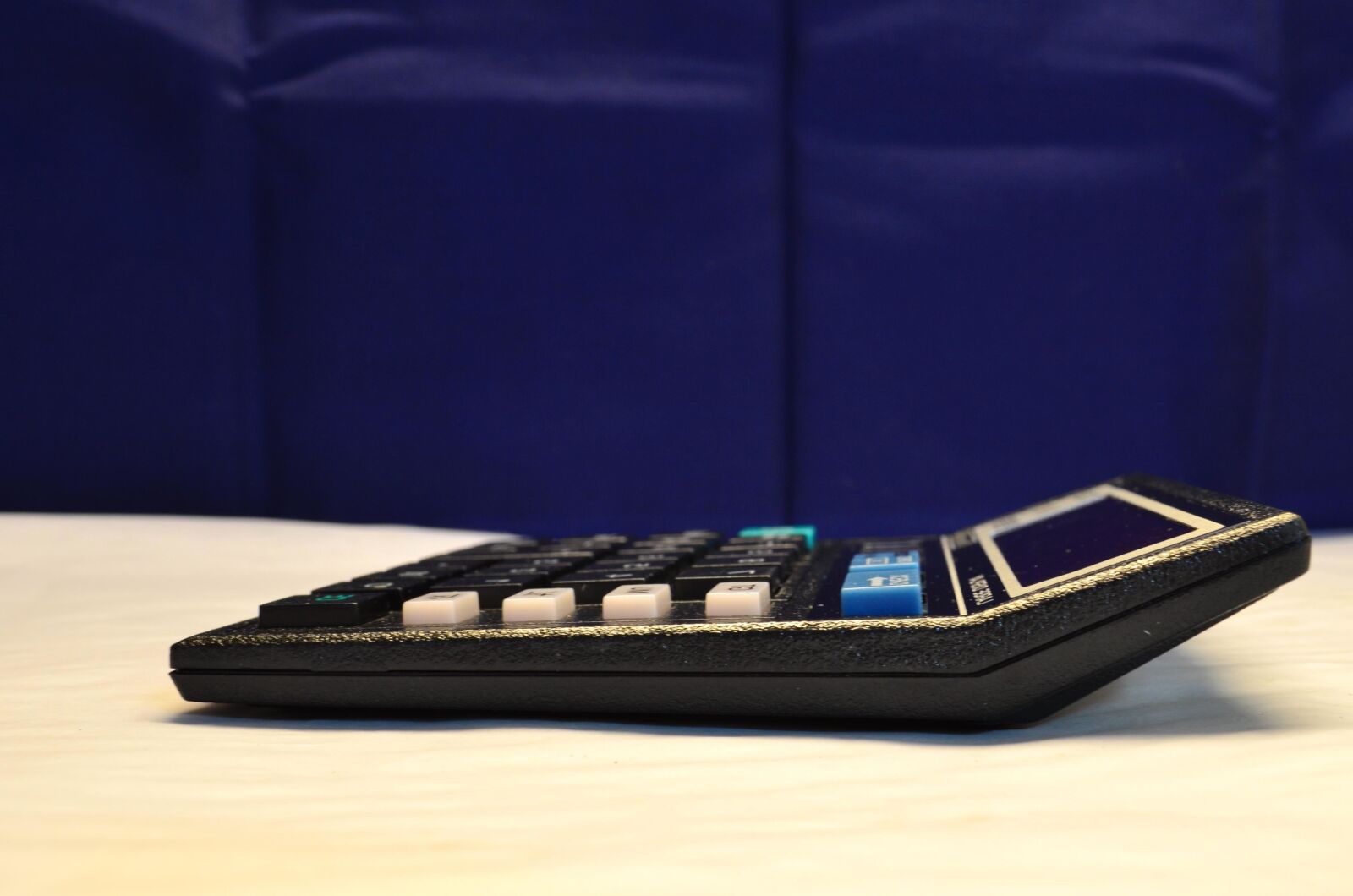 Nikon D5100 sample photo. Calculator, gadget photography