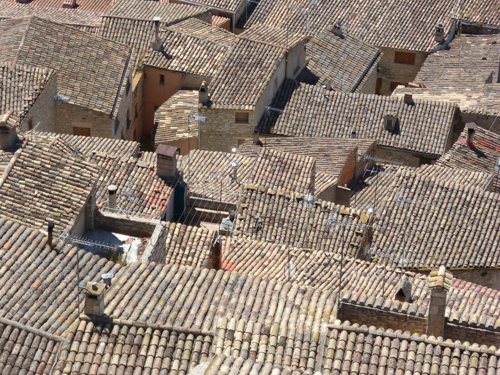 Panasonic DMC-FZ62 sample photo. Roofs, arab tiles, people photography