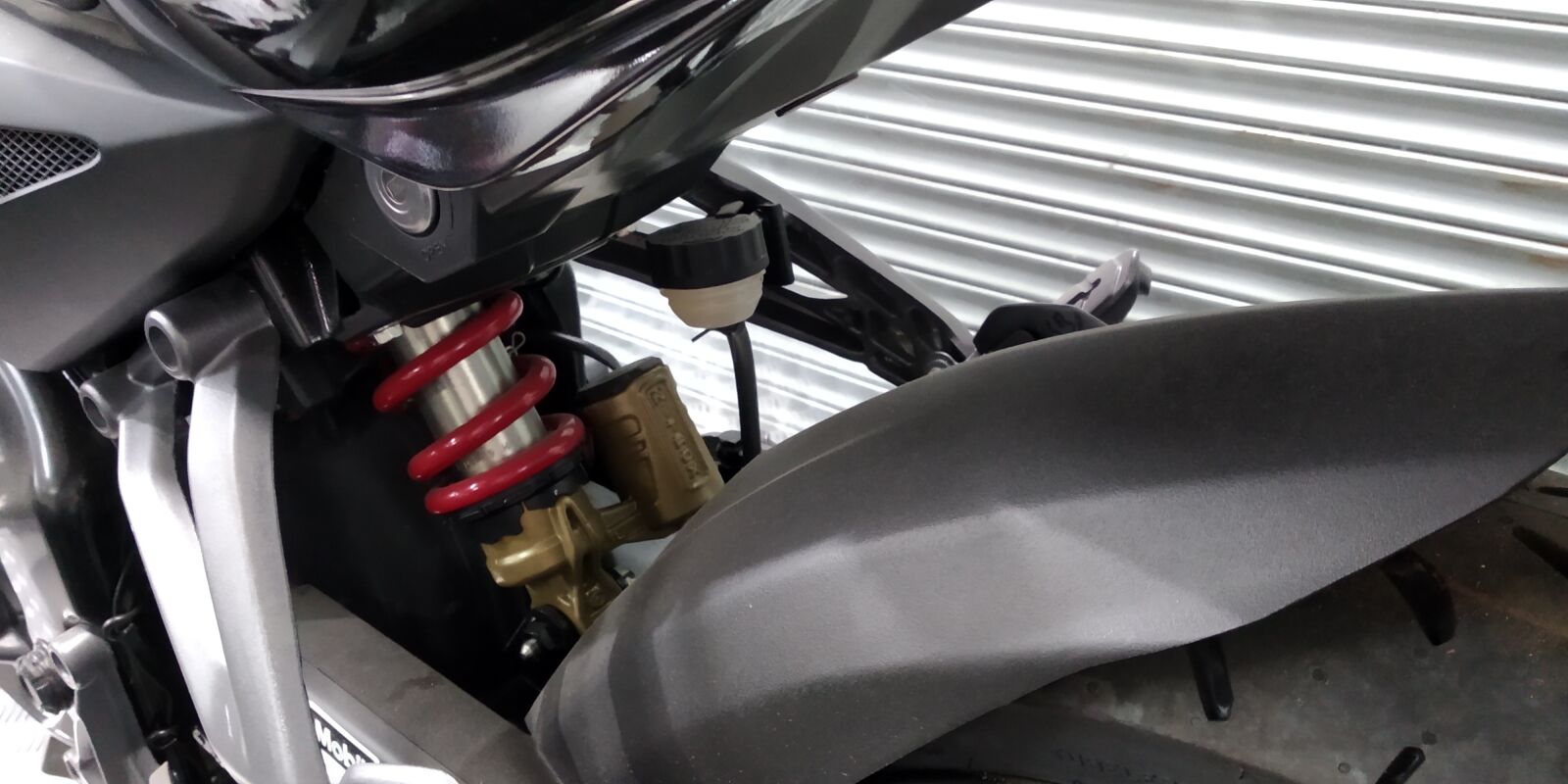 Xiaomi Mi A2 Lite sample photo. Shock absorber, motorcycle, nike photography