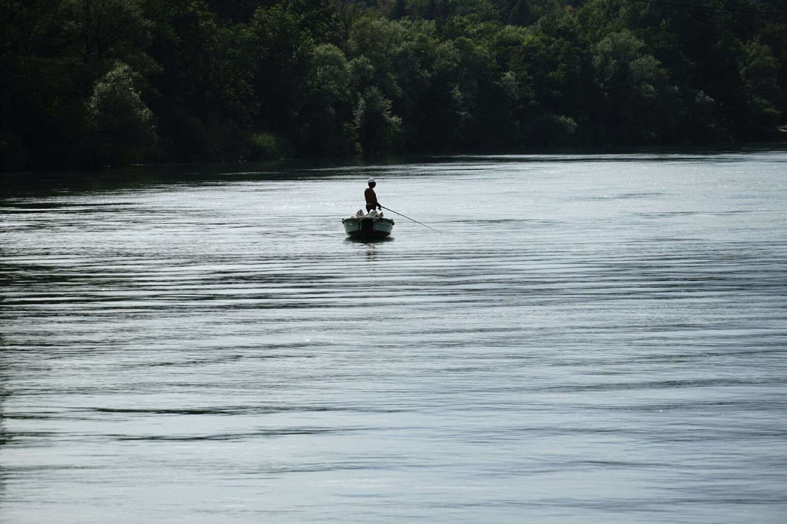 Sony E 18-135mm F3.5-5.6 OSS sample photo. River, boat, fishing photography