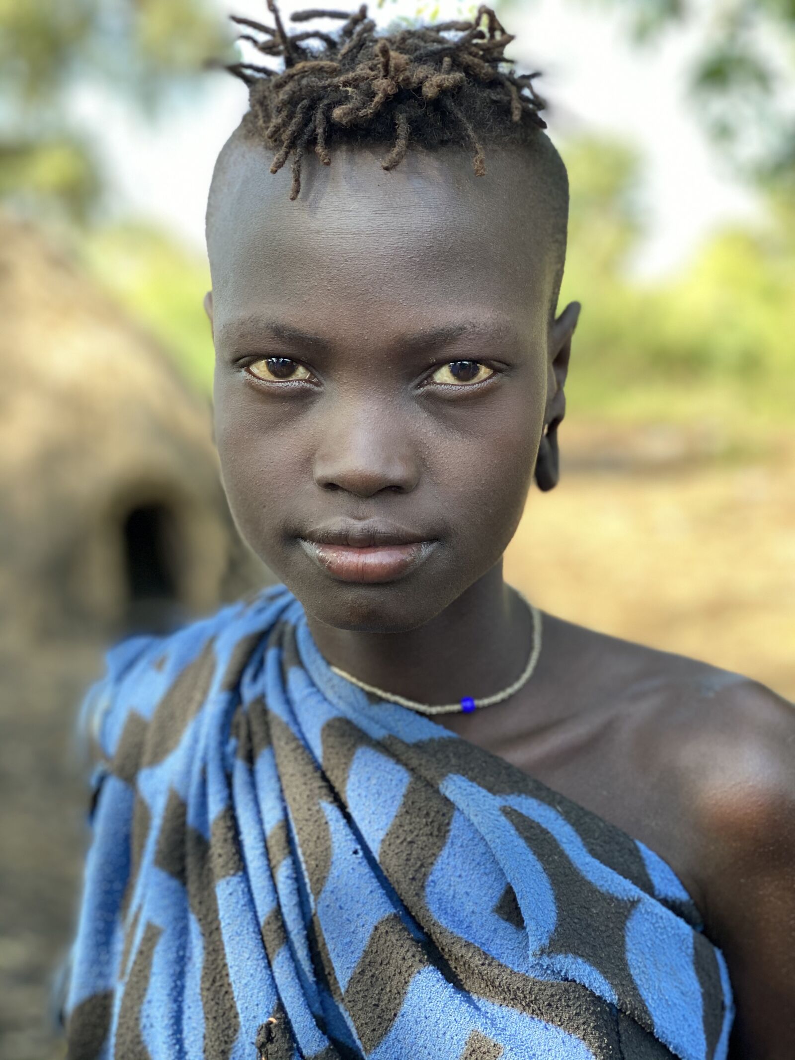 iPhone 11 Pro back dual camera 6mm f/2 sample photo. Omo, valley, ethiopia photography