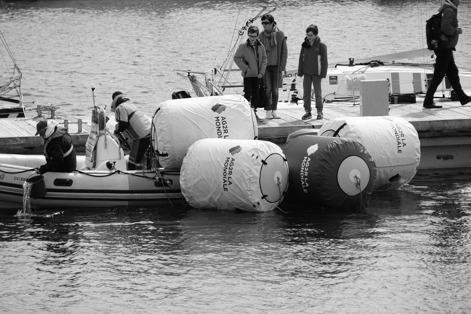 Sony E 55-210mm F4.5-6.3 OSS sample photo. Wharf, buoys, characters photography