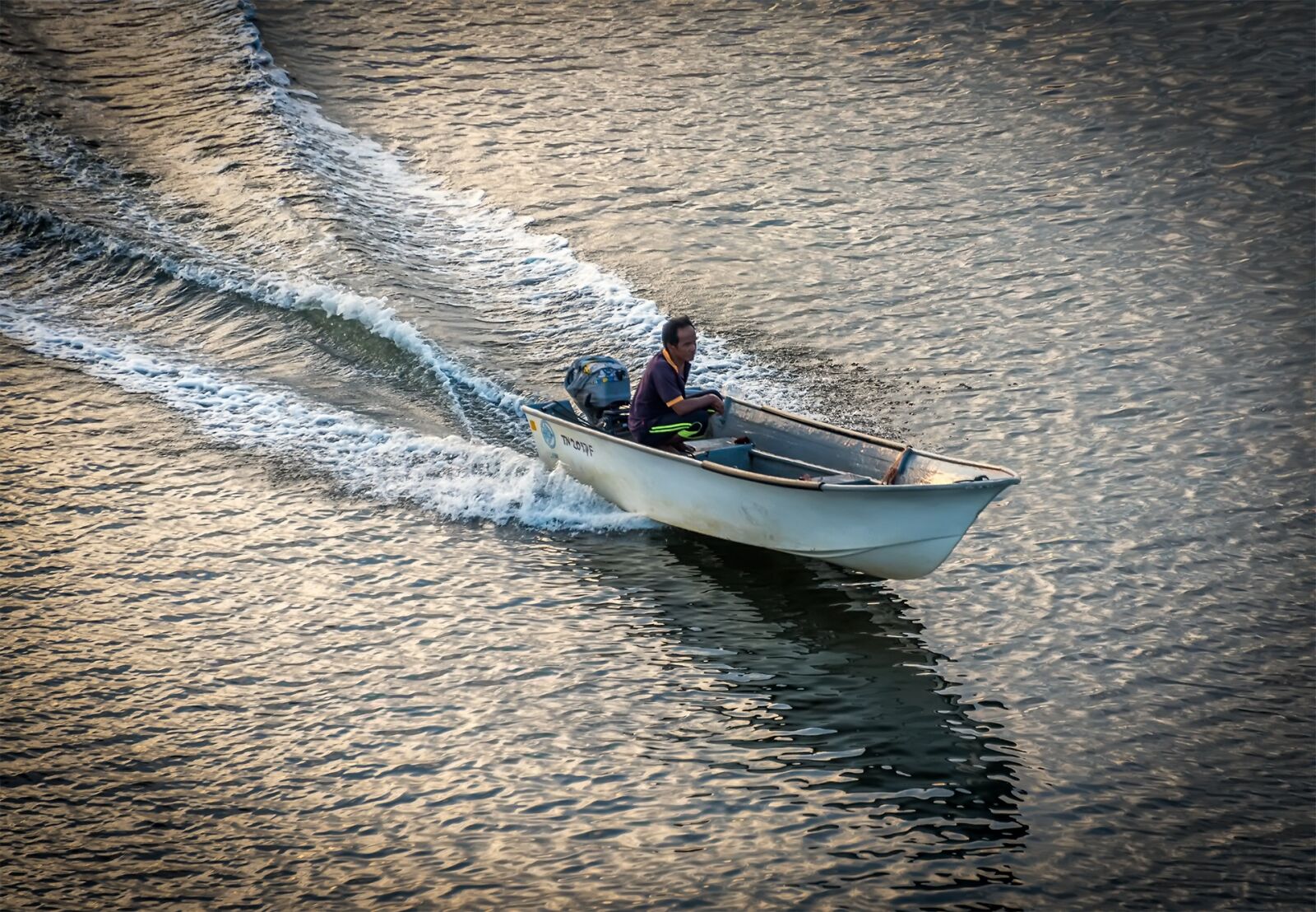 Nikon D750 sample photo. Boat, man, water photography