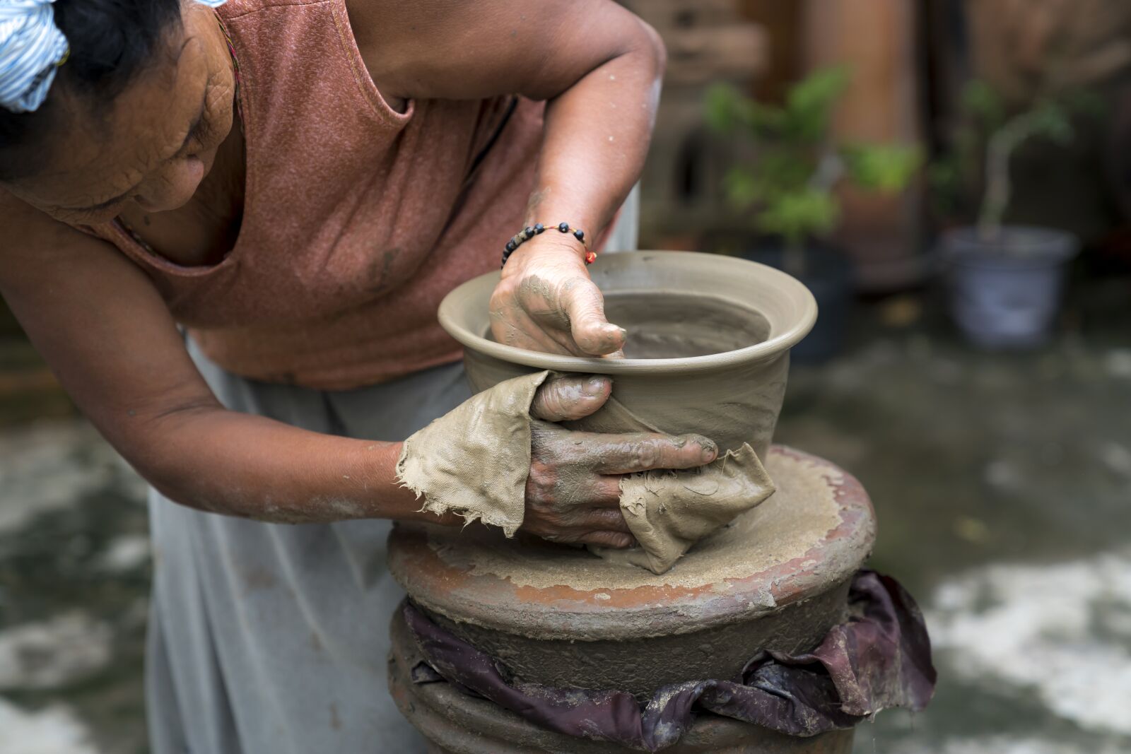 Sony a7R II + Sony FE 24-70mm F2.8 GM sample photo. Adult, asia, pottery photography