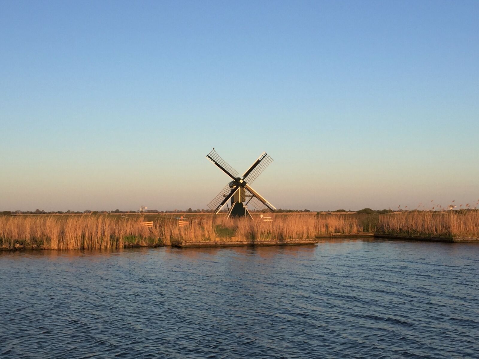 Apple iPhone 6 sample photo. Waters, nature, windmill photography