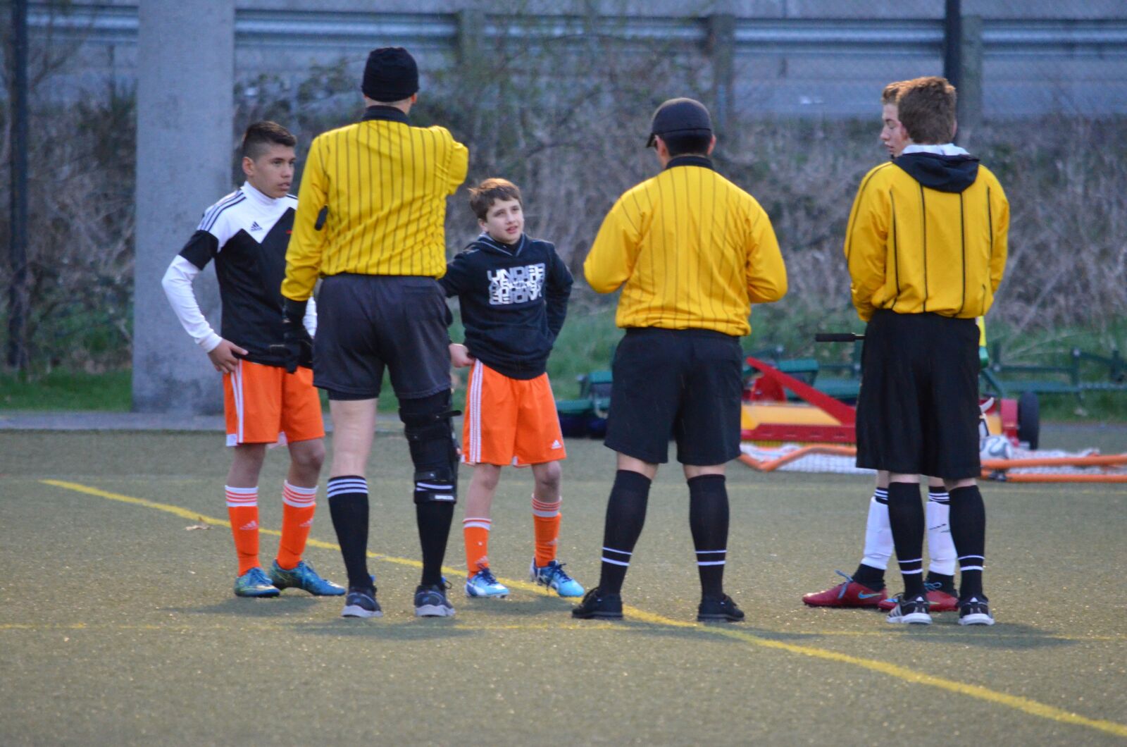 Nikon D5100 sample photo. Soccer, referees, sport photography