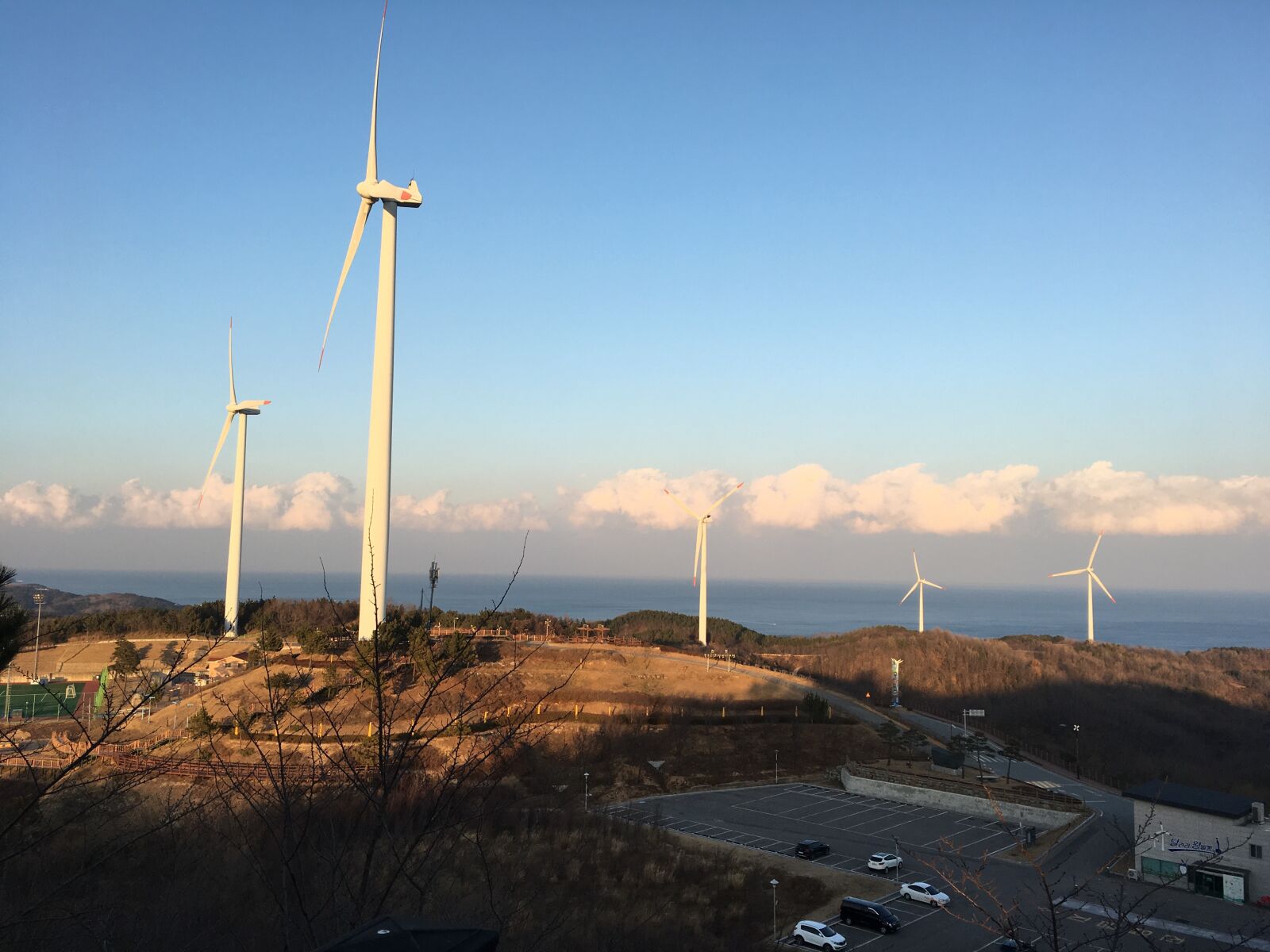 Apple iPhone 6s sample photo. Sea, wind power, sky photography