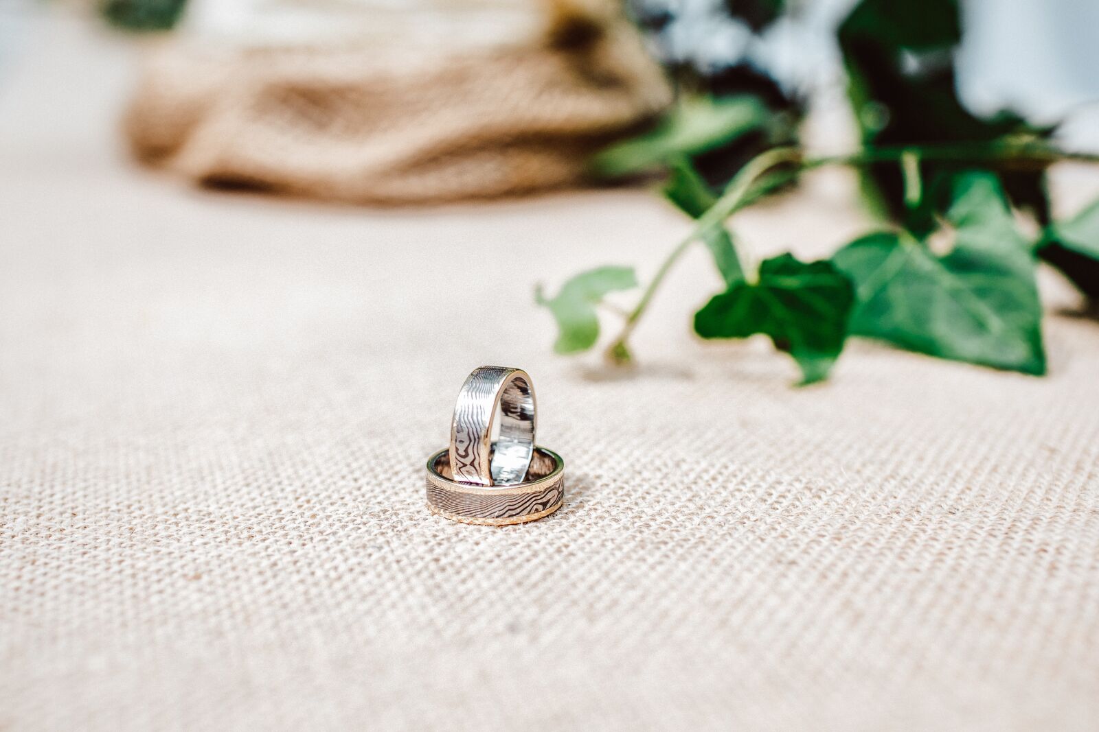 Canon EOS 5D Mark IV + Canon EF 35mm F1.4L USM sample photo. Wedding, wedding rings, marriage photography