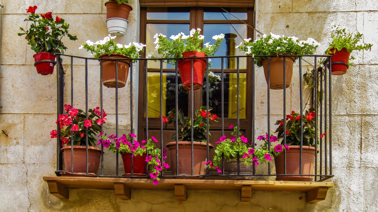 Canon PowerShot SX410 IS sample photo. Balcony, window, flowers photography