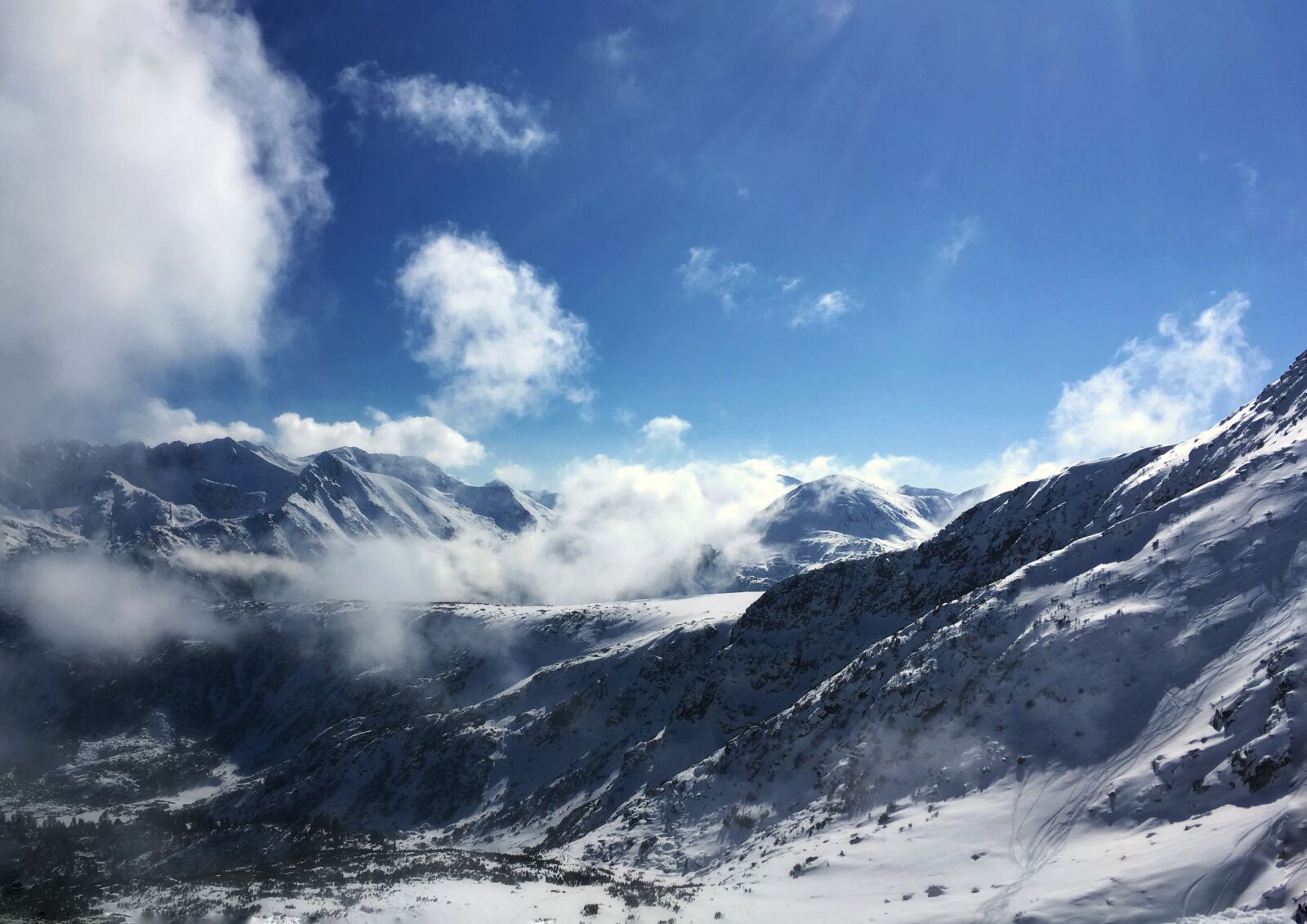 iPhone SE back camera 4.15mm f/2.2 sample photo. Snow mountain, blue, cold photography