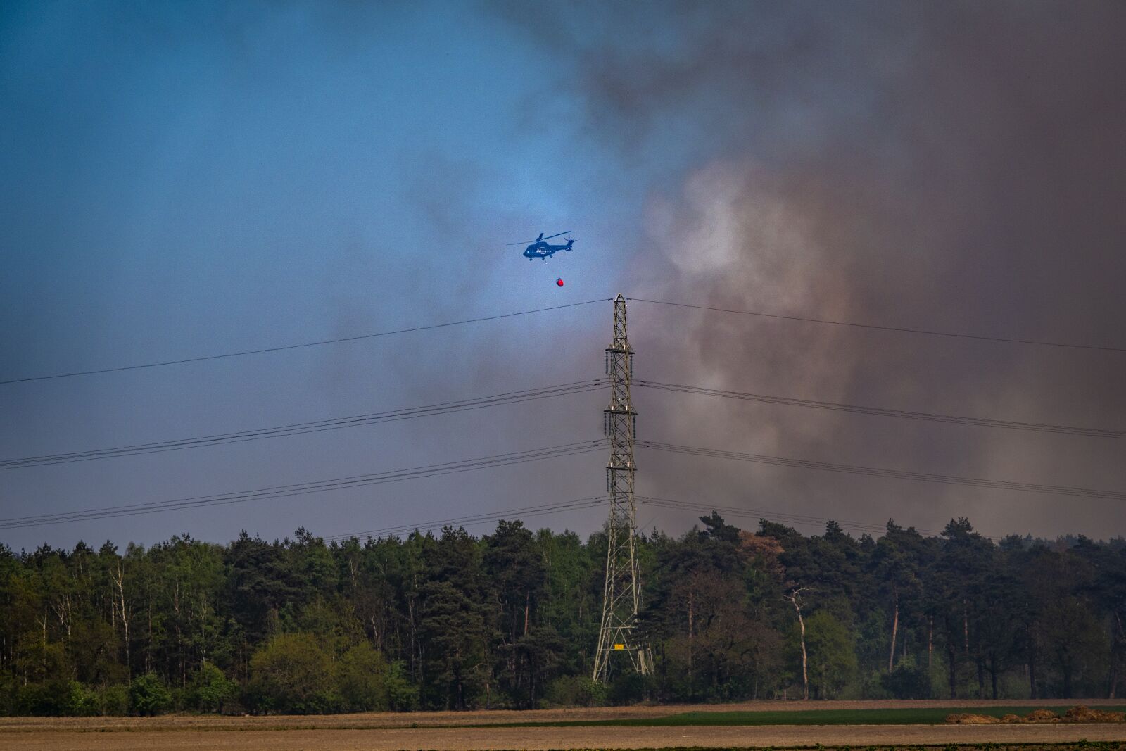 Sony Cyber-shot DSC-RX10 IV sample photo. Fire, blushelicopter, herkenbosch photography
