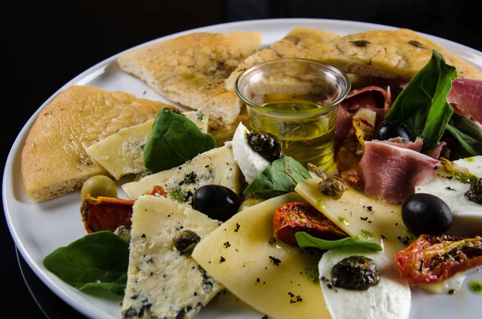 Nikon D7000 sample photo. Foccacia with olives, tasting photography
