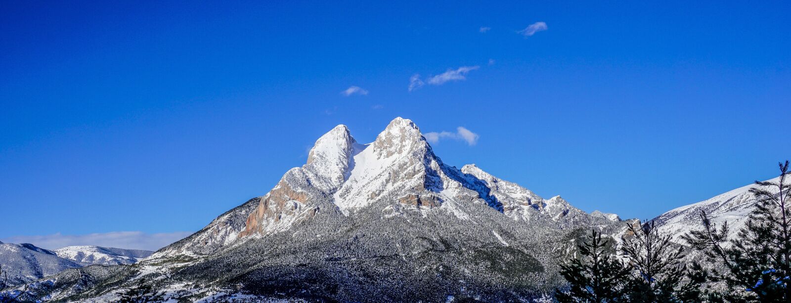 Sony E 16-50mm F3.5-5.6 PZ OSS sample photo. Nature, snow, mountain photography