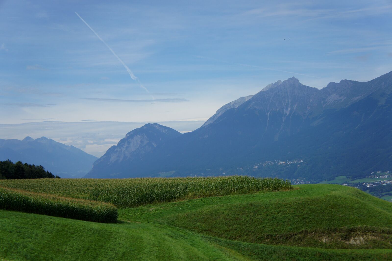 Sony Alpha NEX-5 sample photo. Field, mountains, corn photography